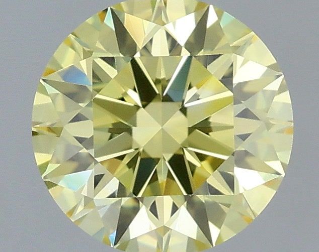 0.69 Carat Round Cut Fancy Yellow