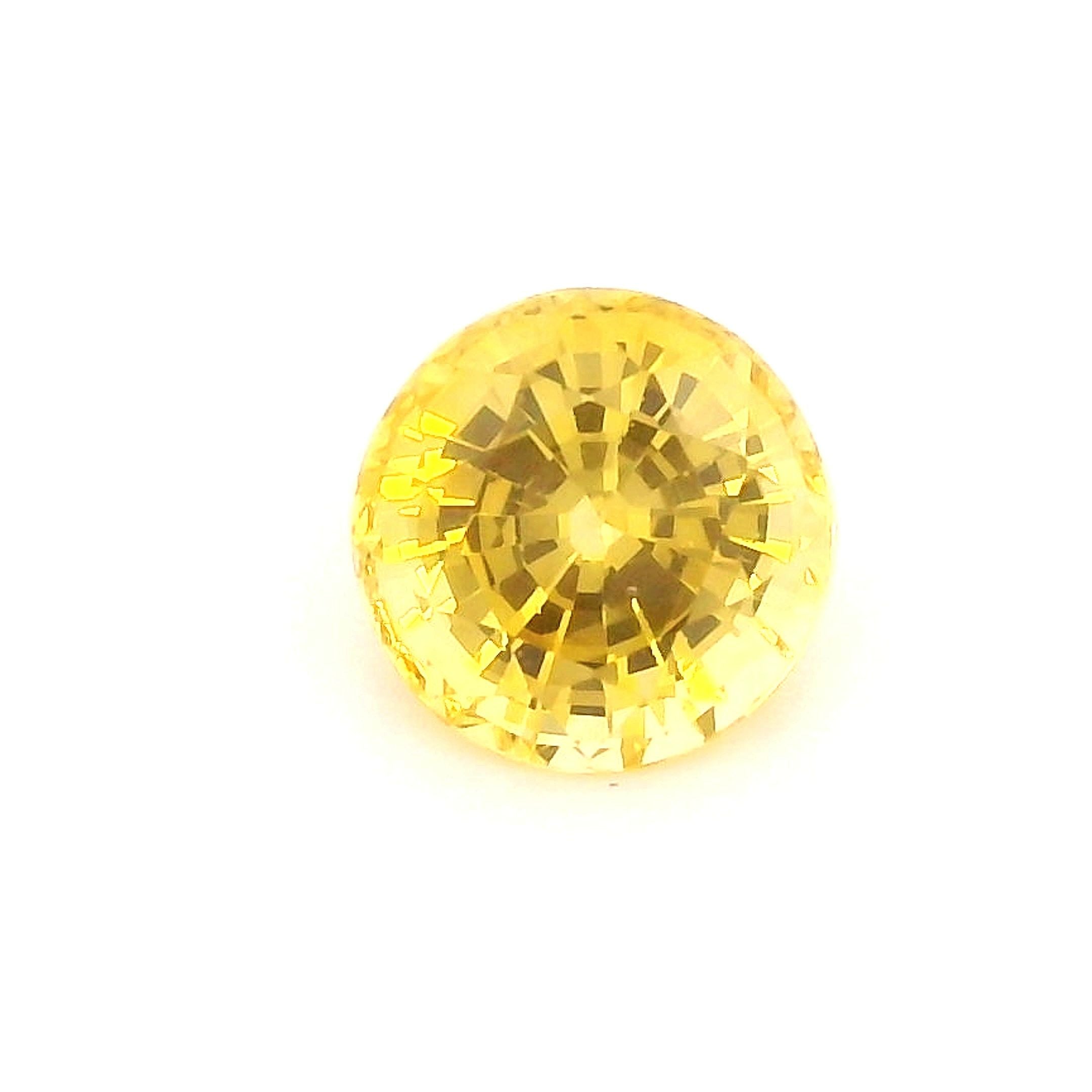 0.56 Carat Round Cut Yellow Sapphire