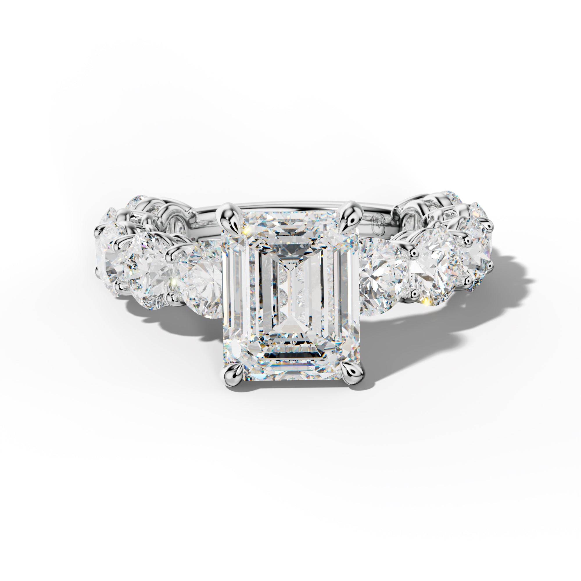 Johanna Emerald Cut Engagement Ring With Round Side Stones
