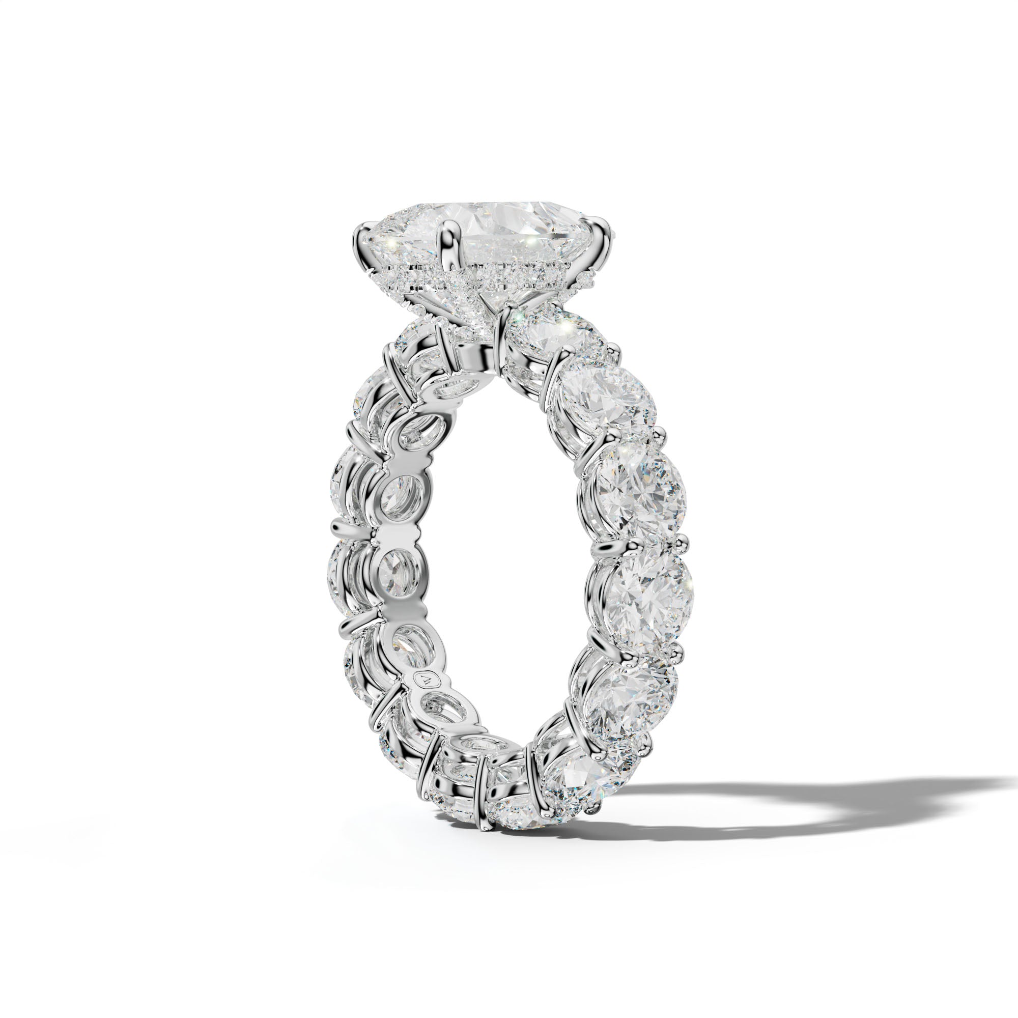 Maddie Pear Shape Engagement Ring With Round Side Stones