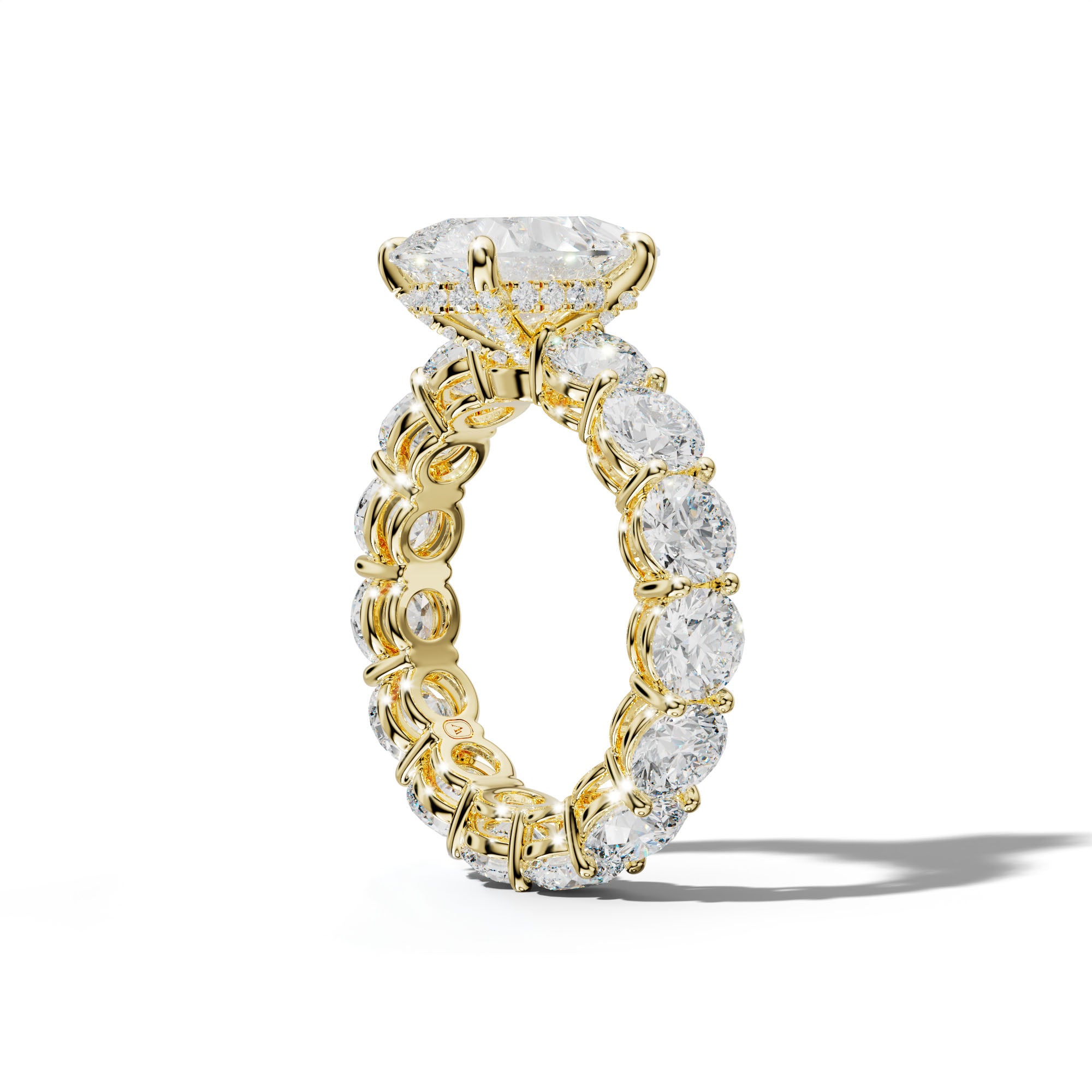 Maddie Pear Shape Engagement Ring With Round Side Stones