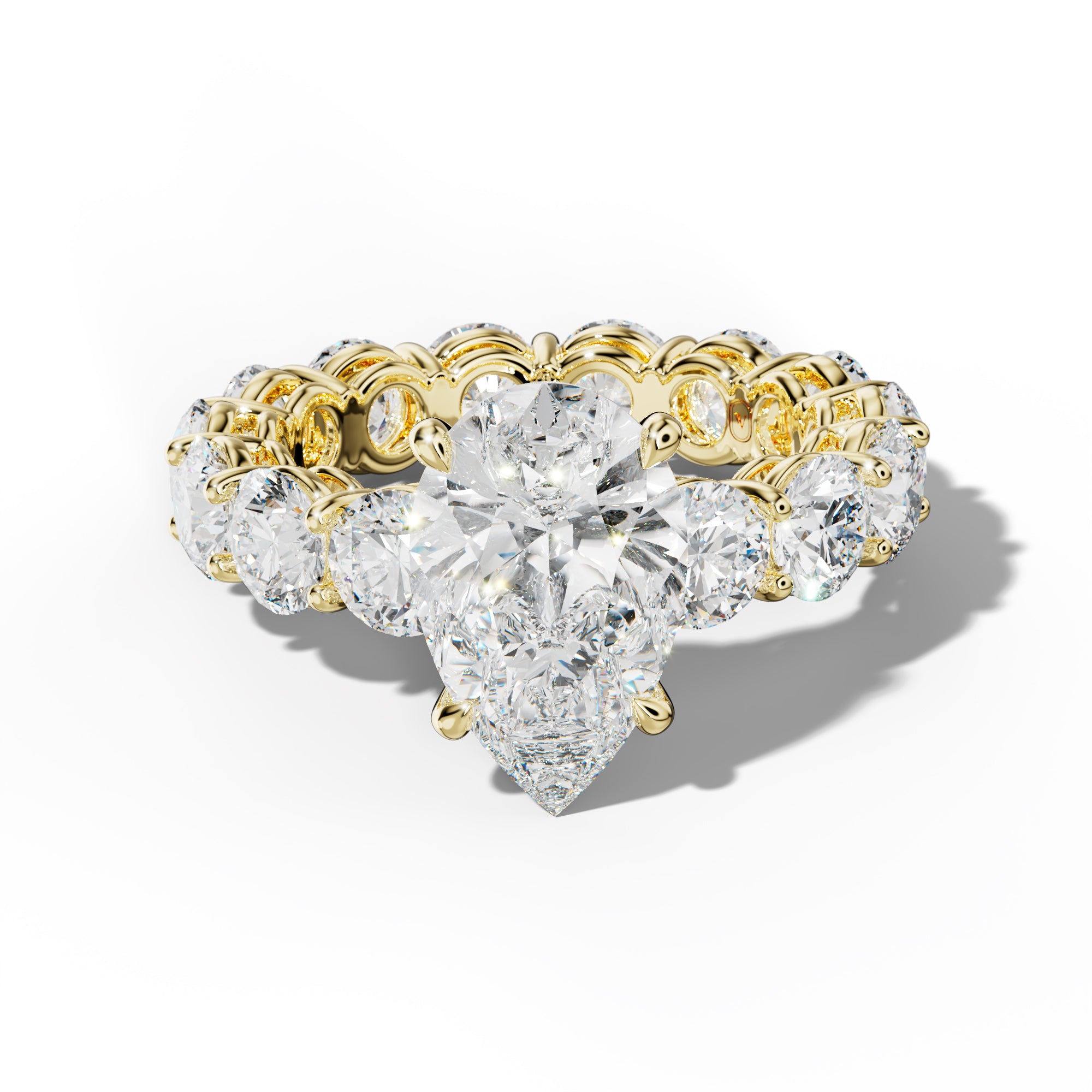 Maddie Pear Shape Engagement Ring With Round Side Stones