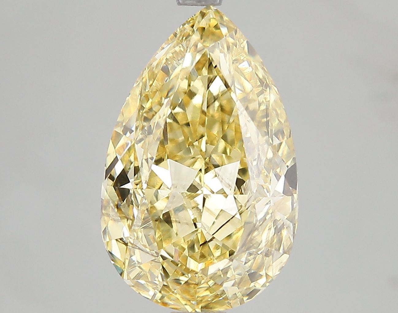 5.02 Carat Pear Cut Fancy Yellow