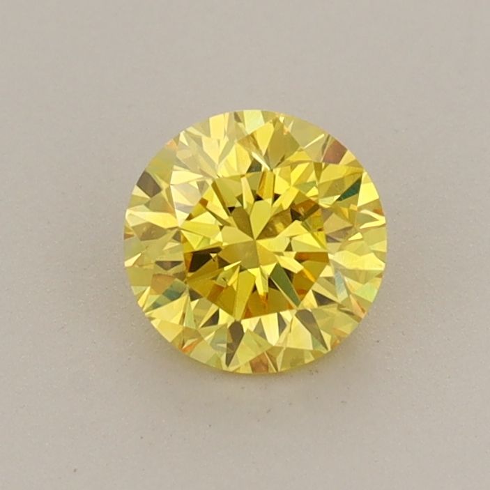 0.56 Carat Round Cut Fancy Yellow