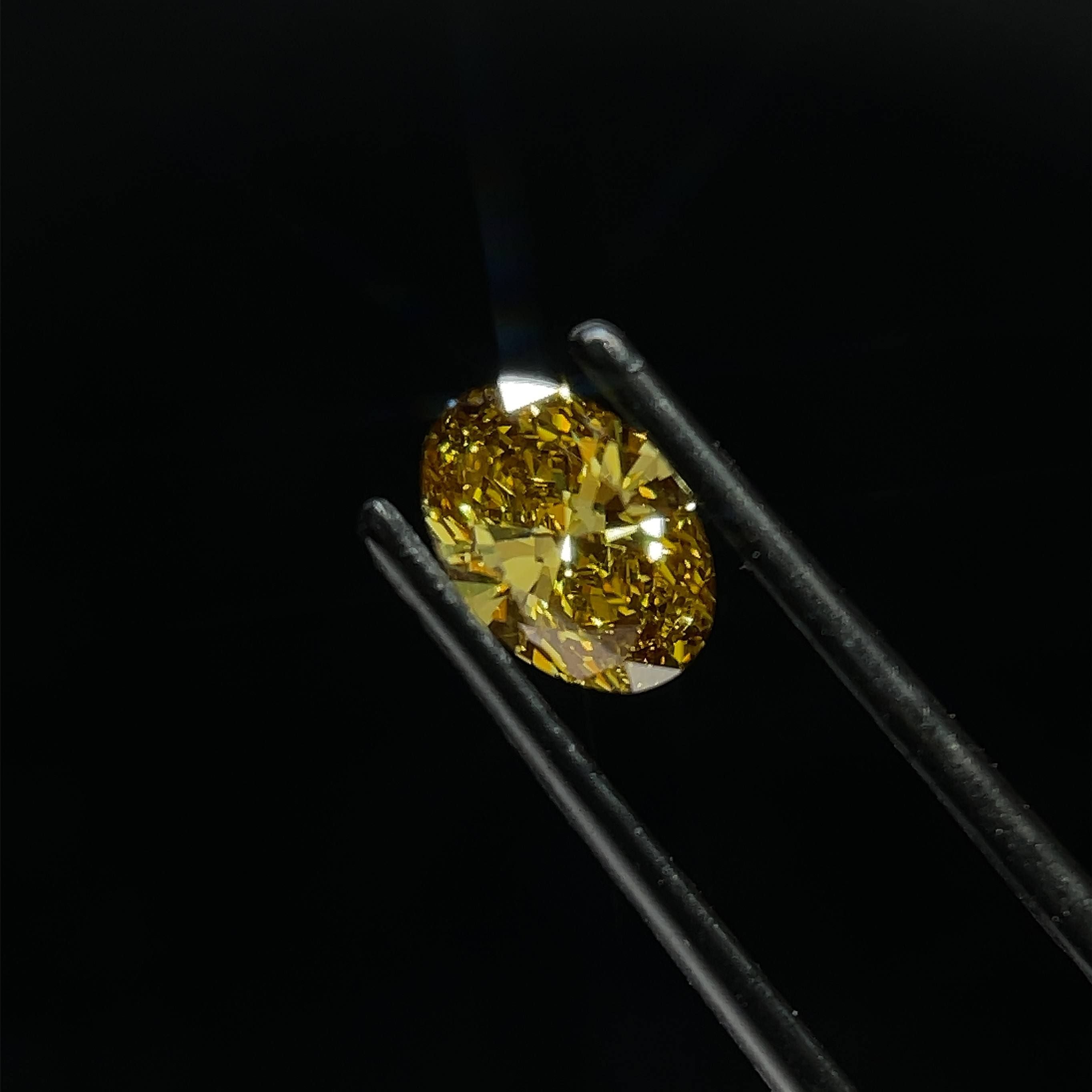 0.99 Carat Oval Cut Fancy Yellow