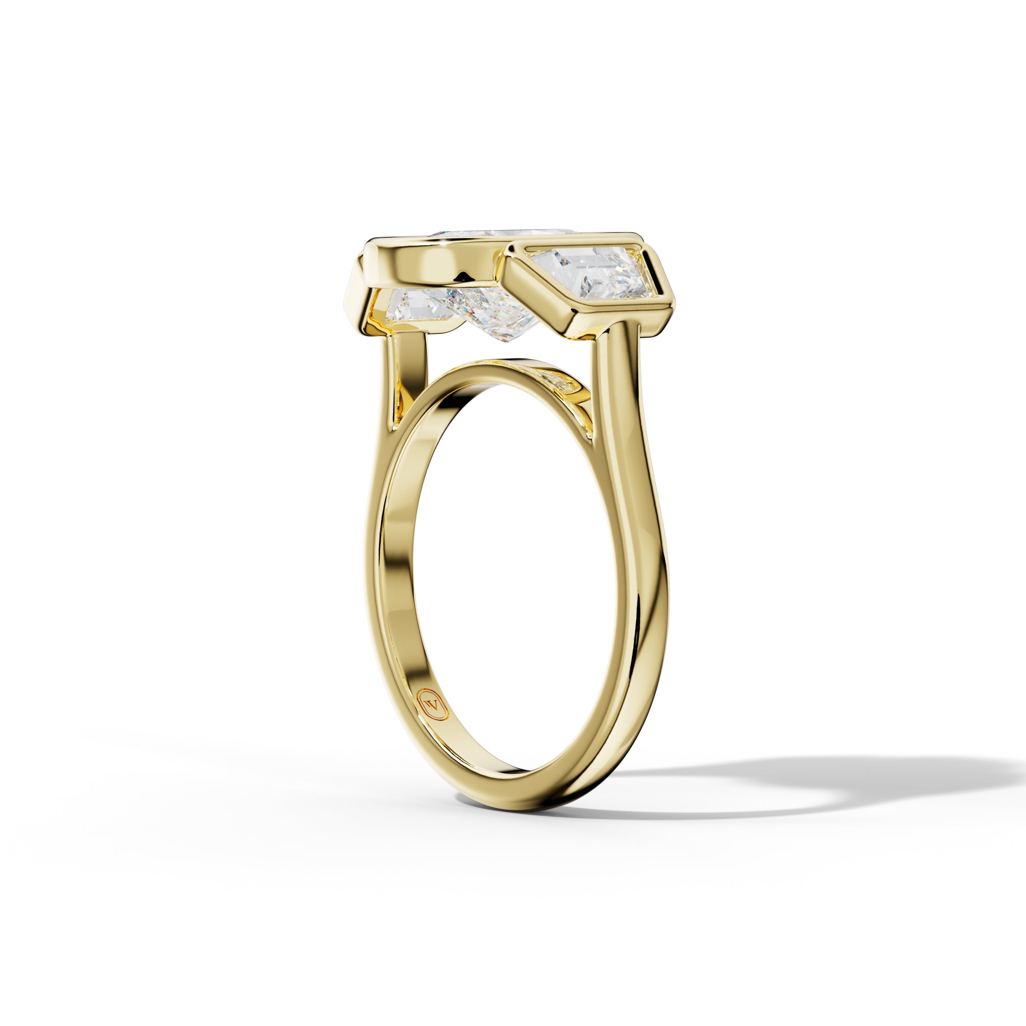 Cleo Elongated Cushion Center With Trapezoid Side Diamond Engagement Ring