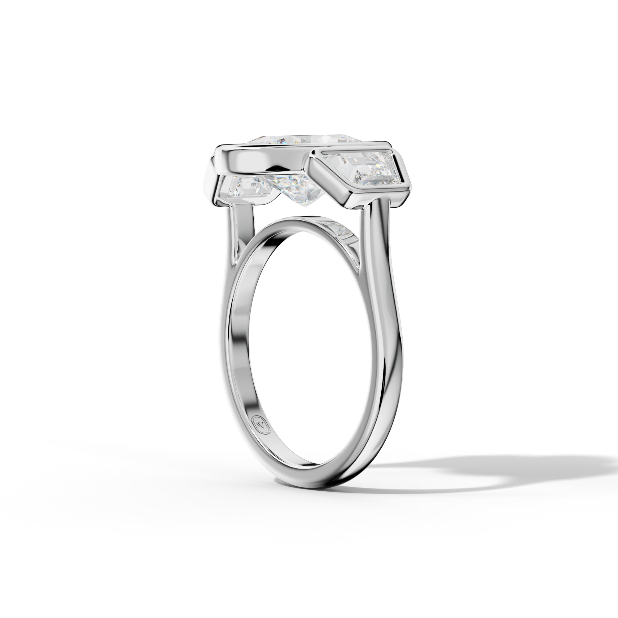 Cleo Oval Center With Trapezoid Side Diamond Engagement Ring