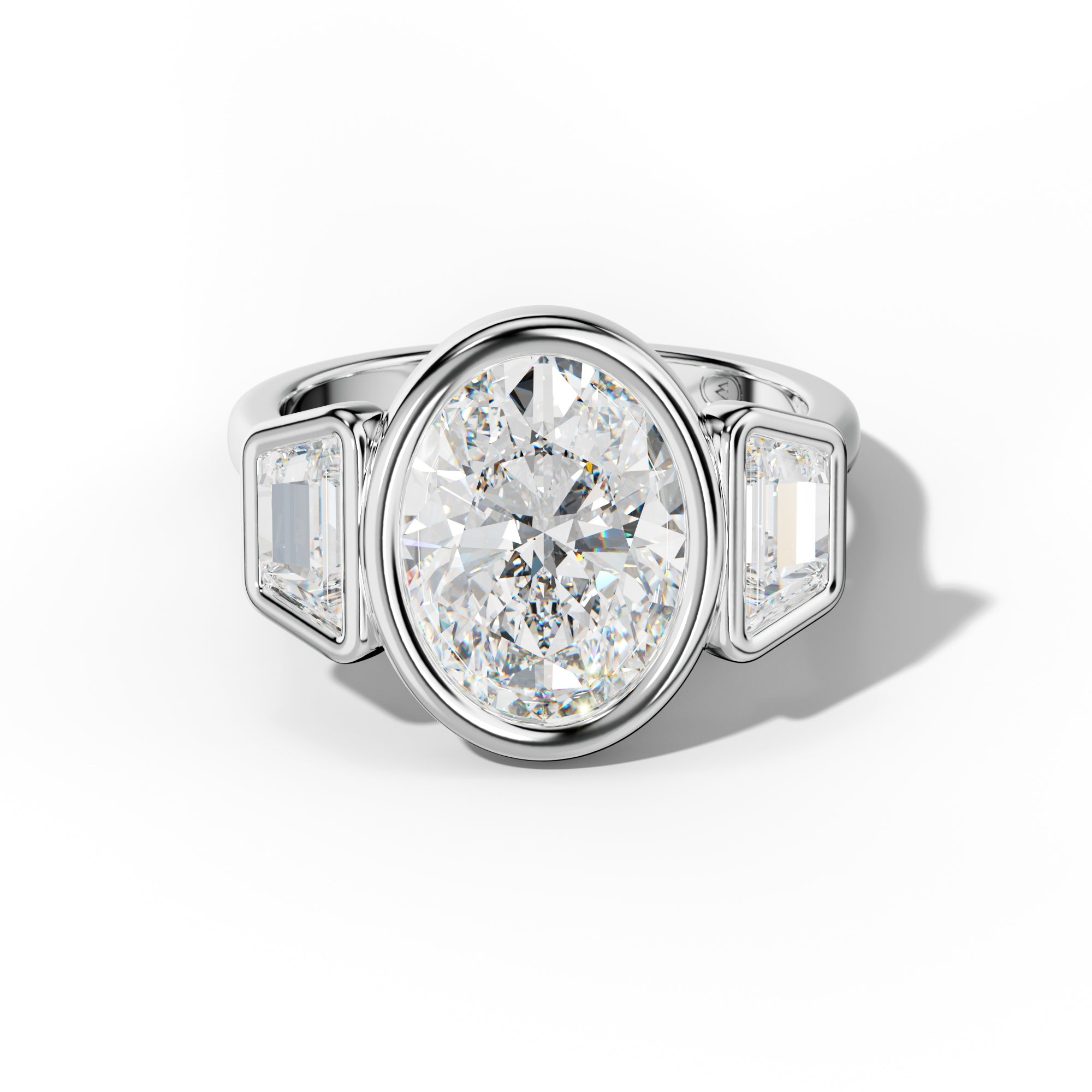 Cleo Oval Center With Trapezoid Side Diamond Engagement Ring