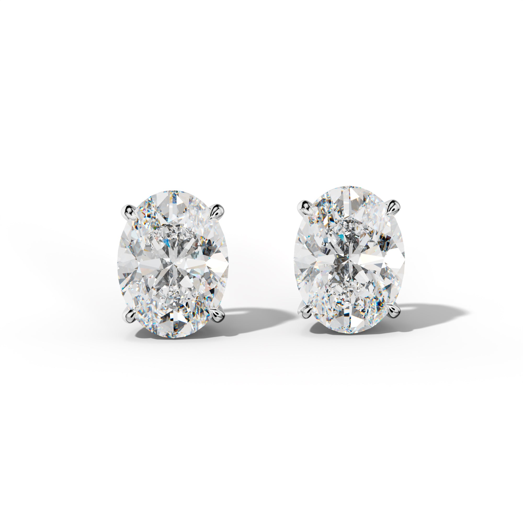 Oval Diamond Stud Earrings With Four Claw Prongs