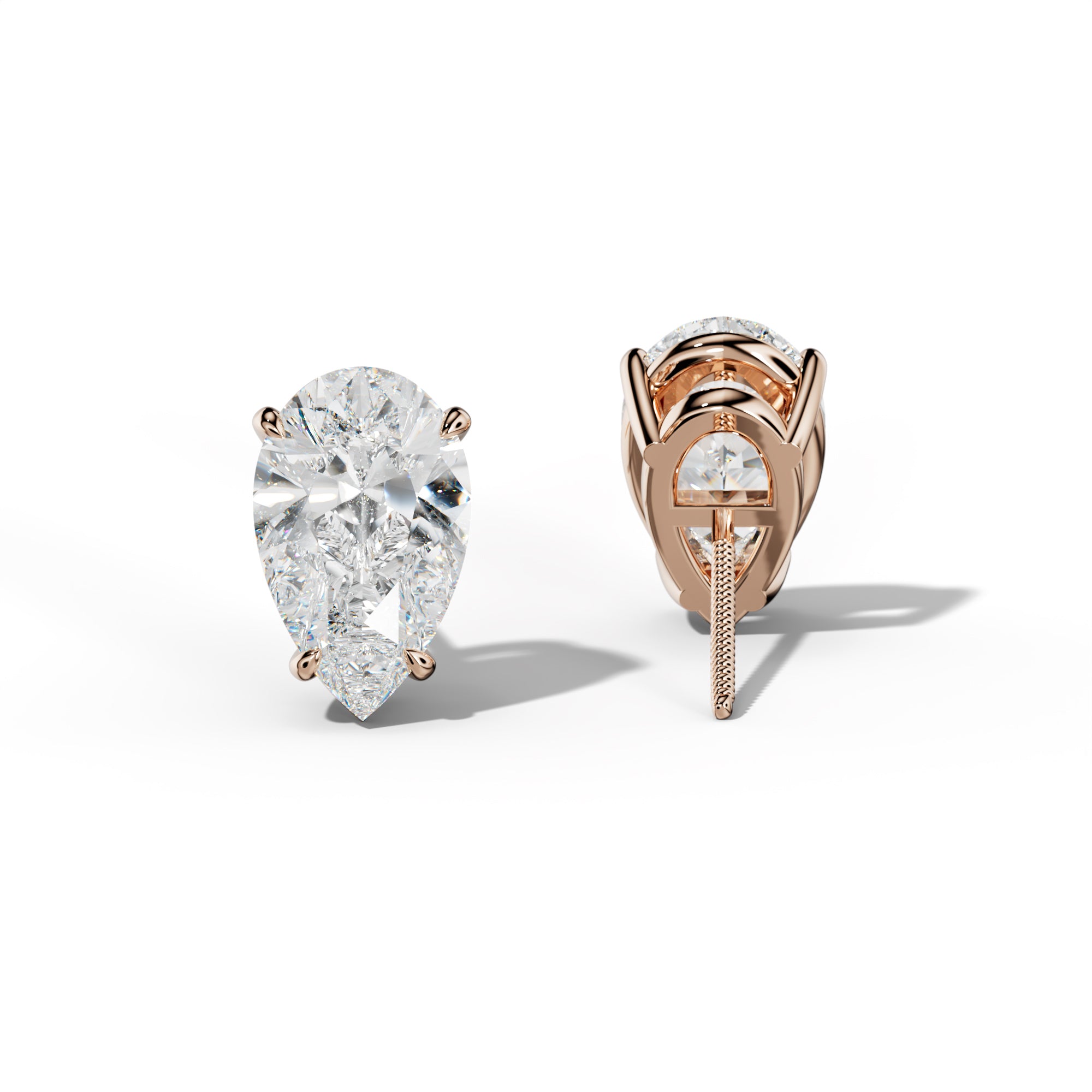 Pear Shape Diamond Stud Earrings With Four Claw Prongs