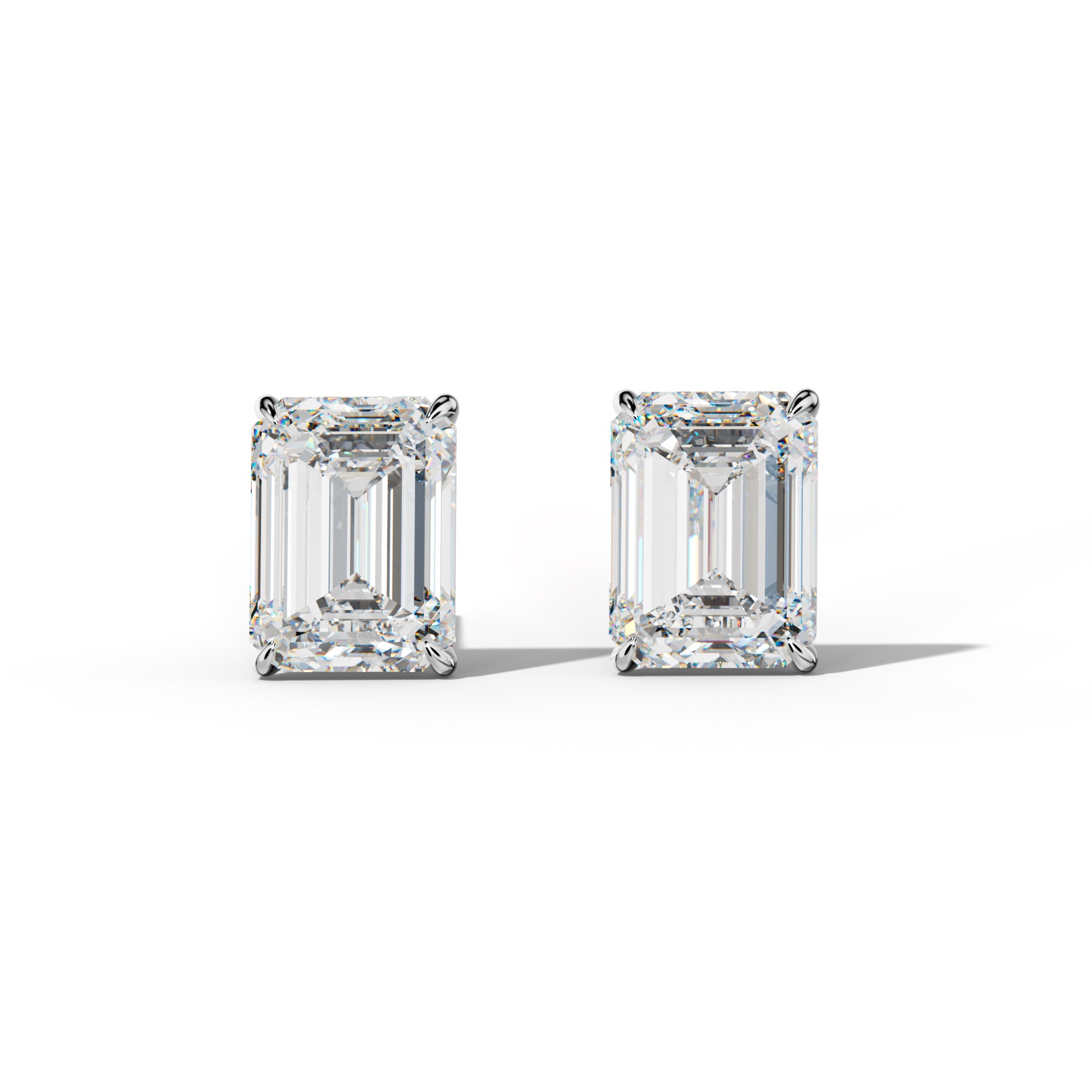 Emerald Cut Diamond Stud Earrings With Four Prong Martini Settings