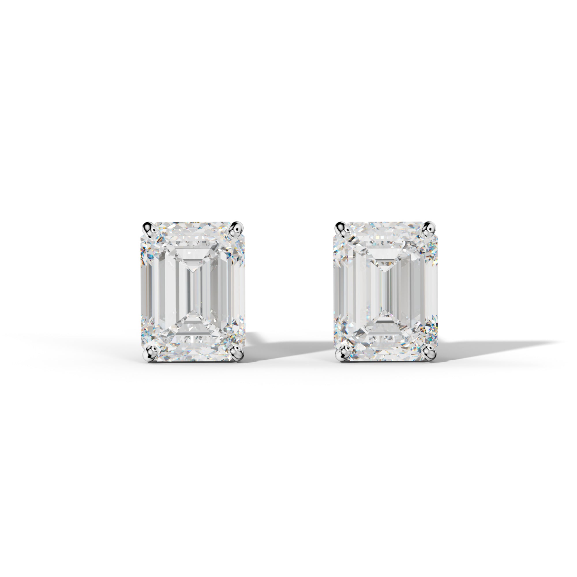 Emerald Cut Diamond Stud Earrings With Four Classic Prong Martini Settings