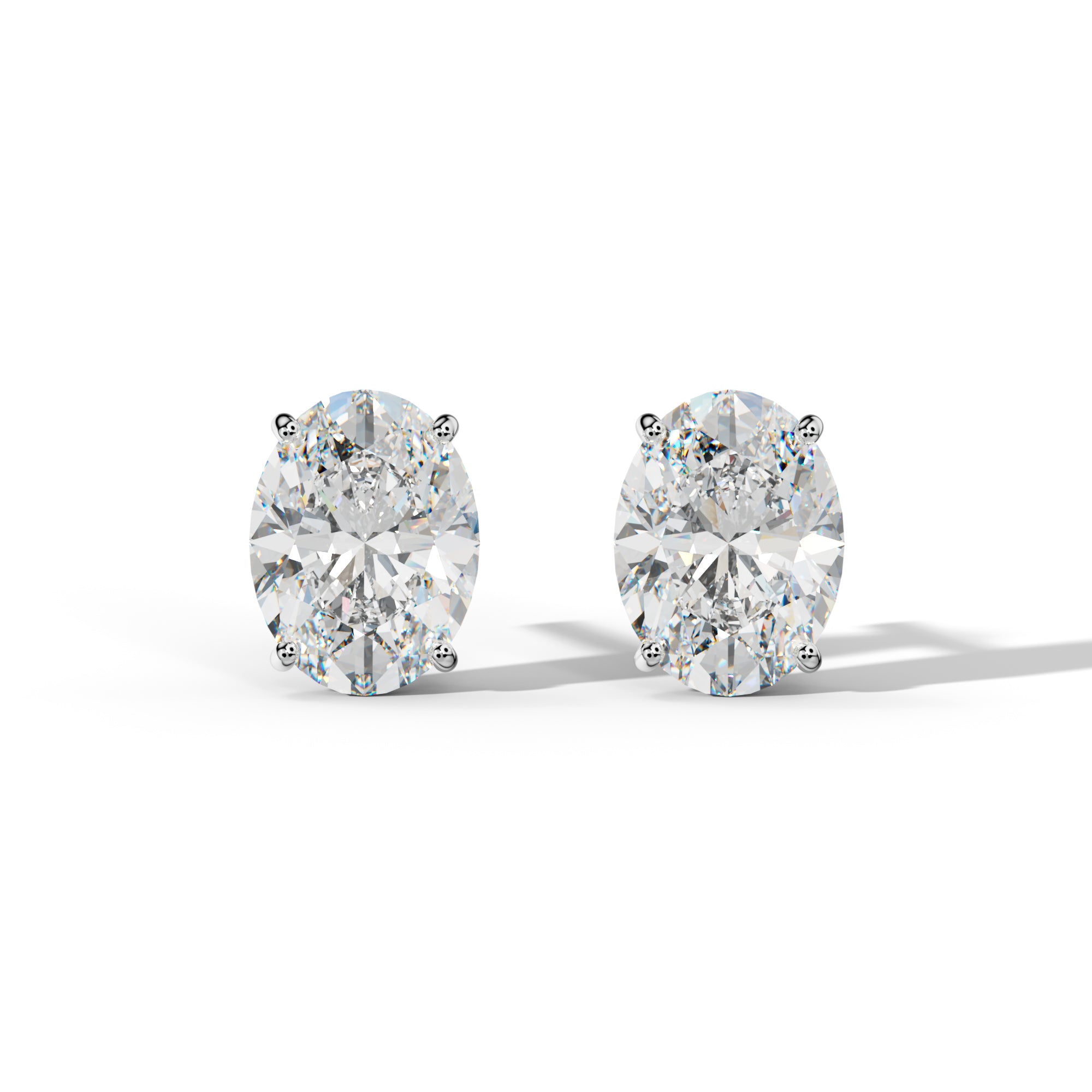 Oval Diamond Stud Earrings With Four Classic Prong Martini Settings