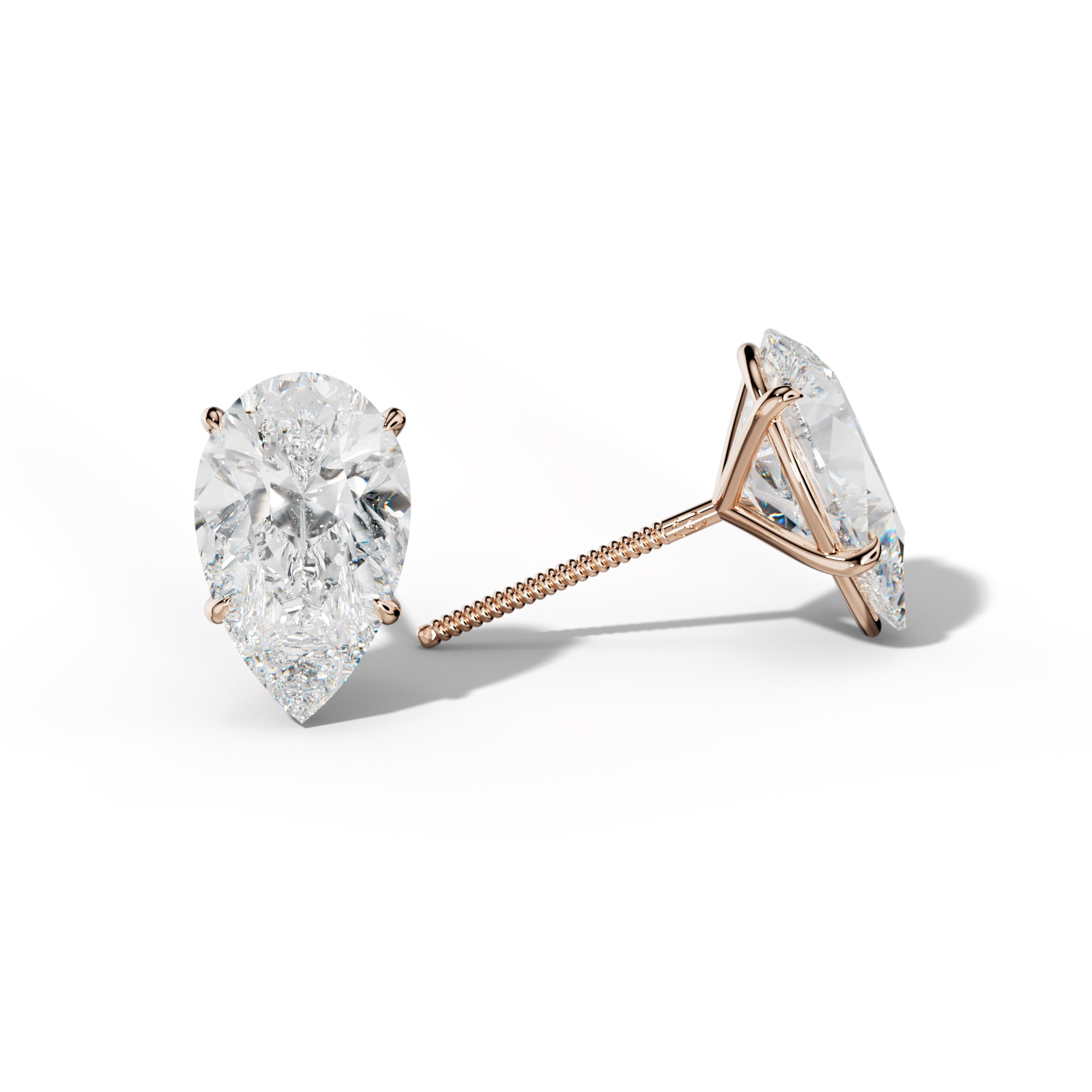 Pear Shape Diamond Stud Earrings With Four Prong Martini Settings