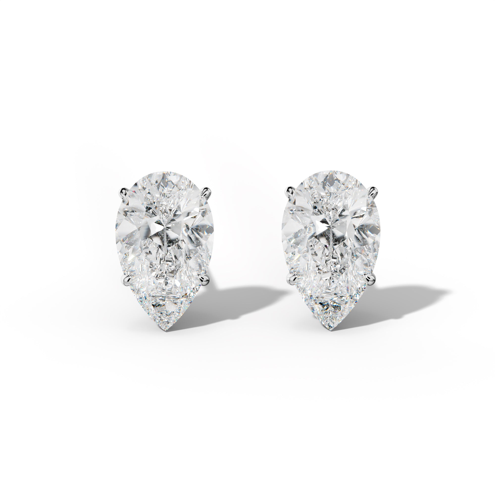 Pear Shape Diamond Stud Earrings With Four Prong Martini Settings