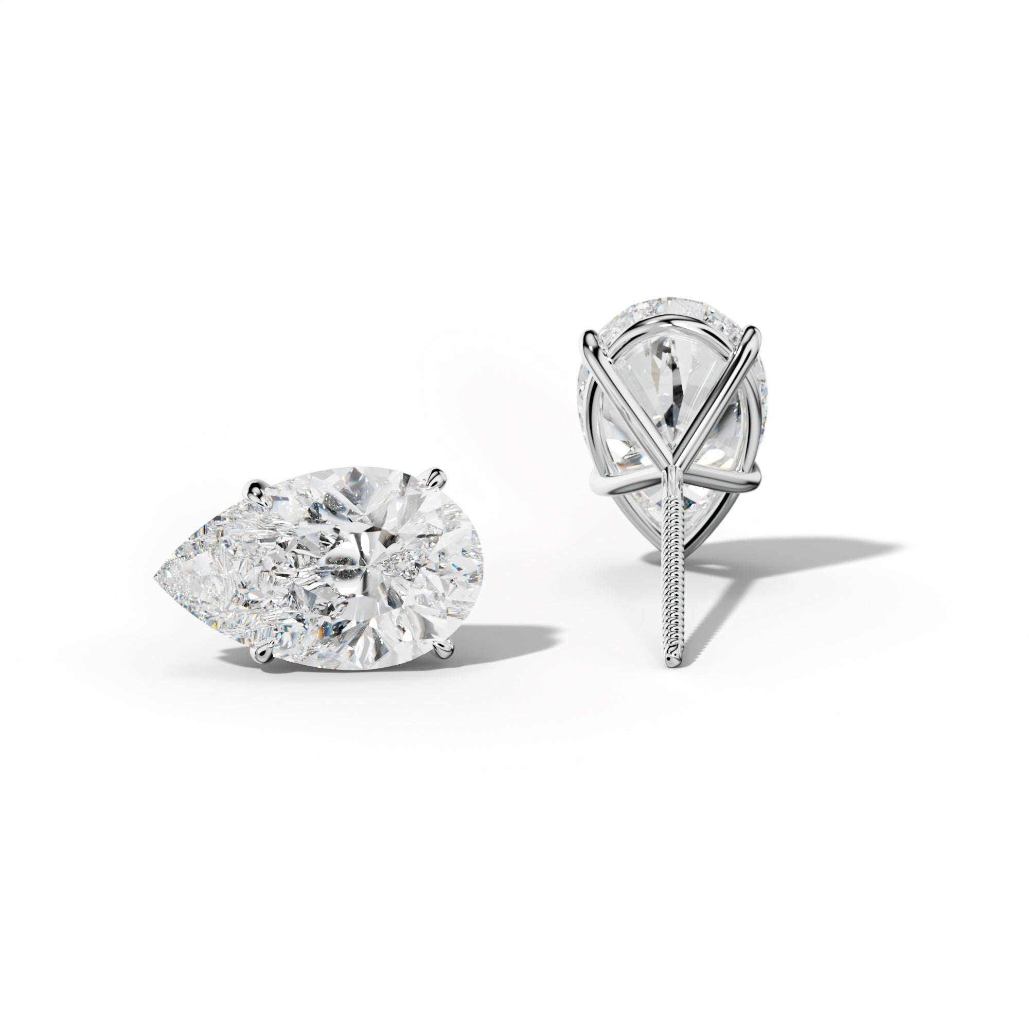 Pear Shape Diamond Stud Earrings With Four Prong Martini Settings