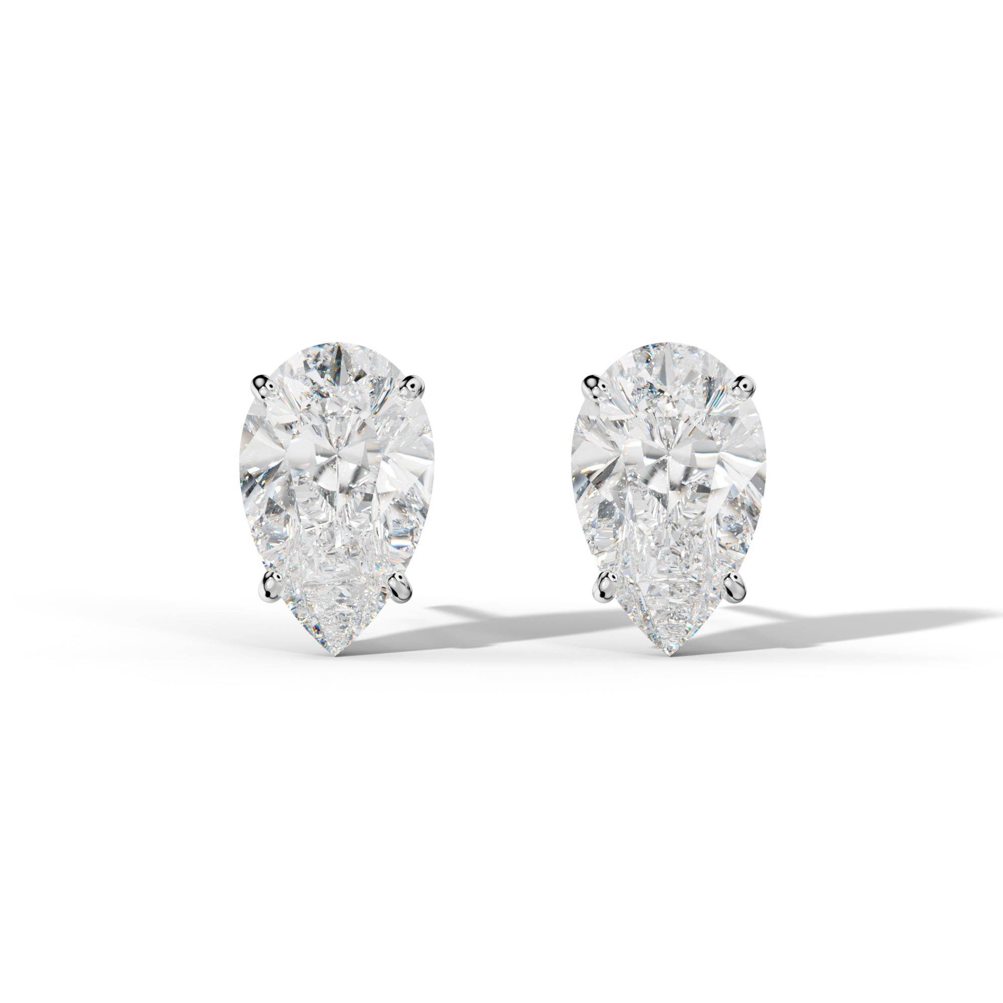 Pear Shape Diamond Stud Earrings With Four Classic Prong Martini Settings