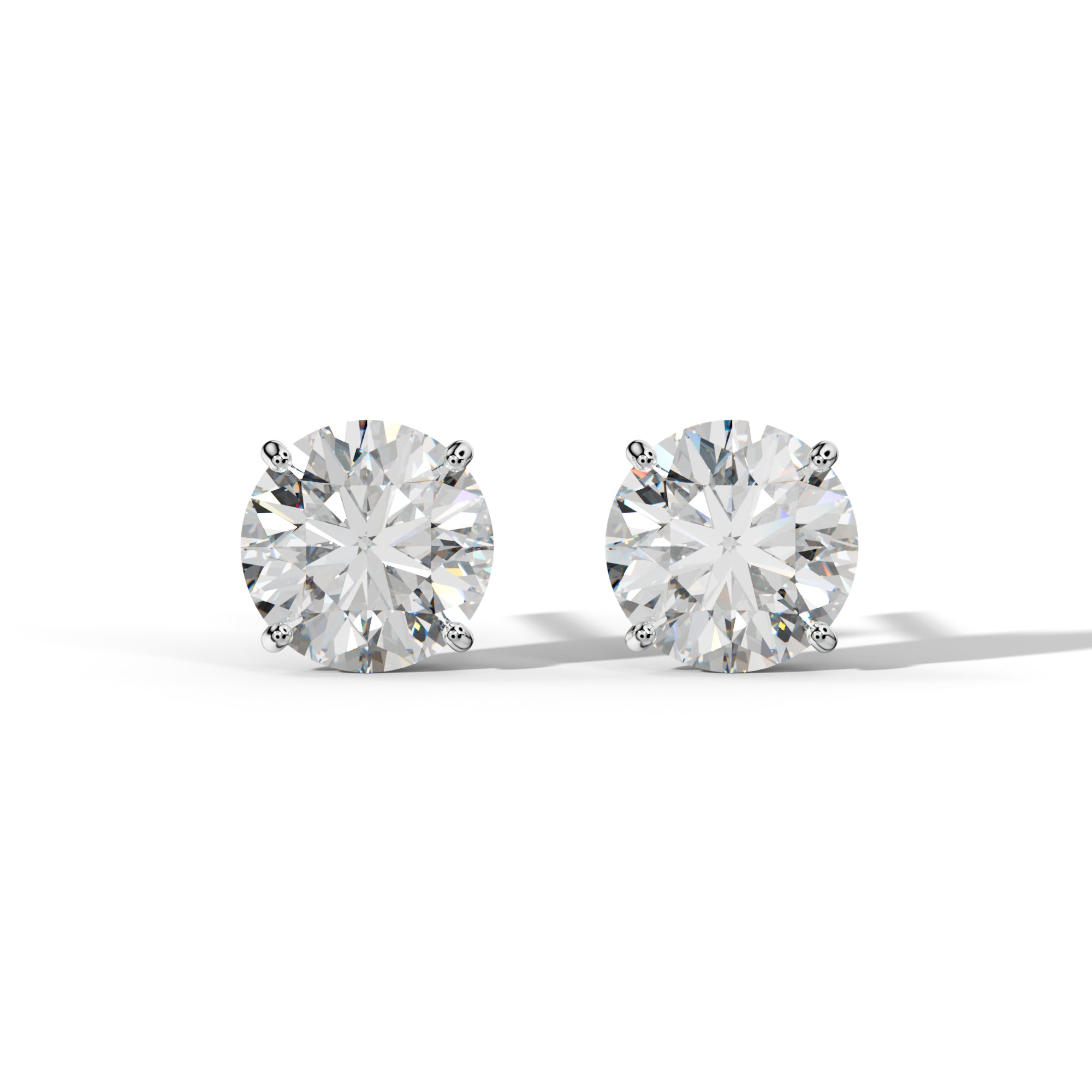 Round Diamond Stud Earrings With Four Classic Prong Martini Settings