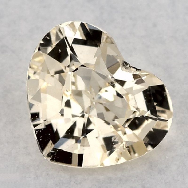 0.79 Carat Heart Cut Yellow Sapphire