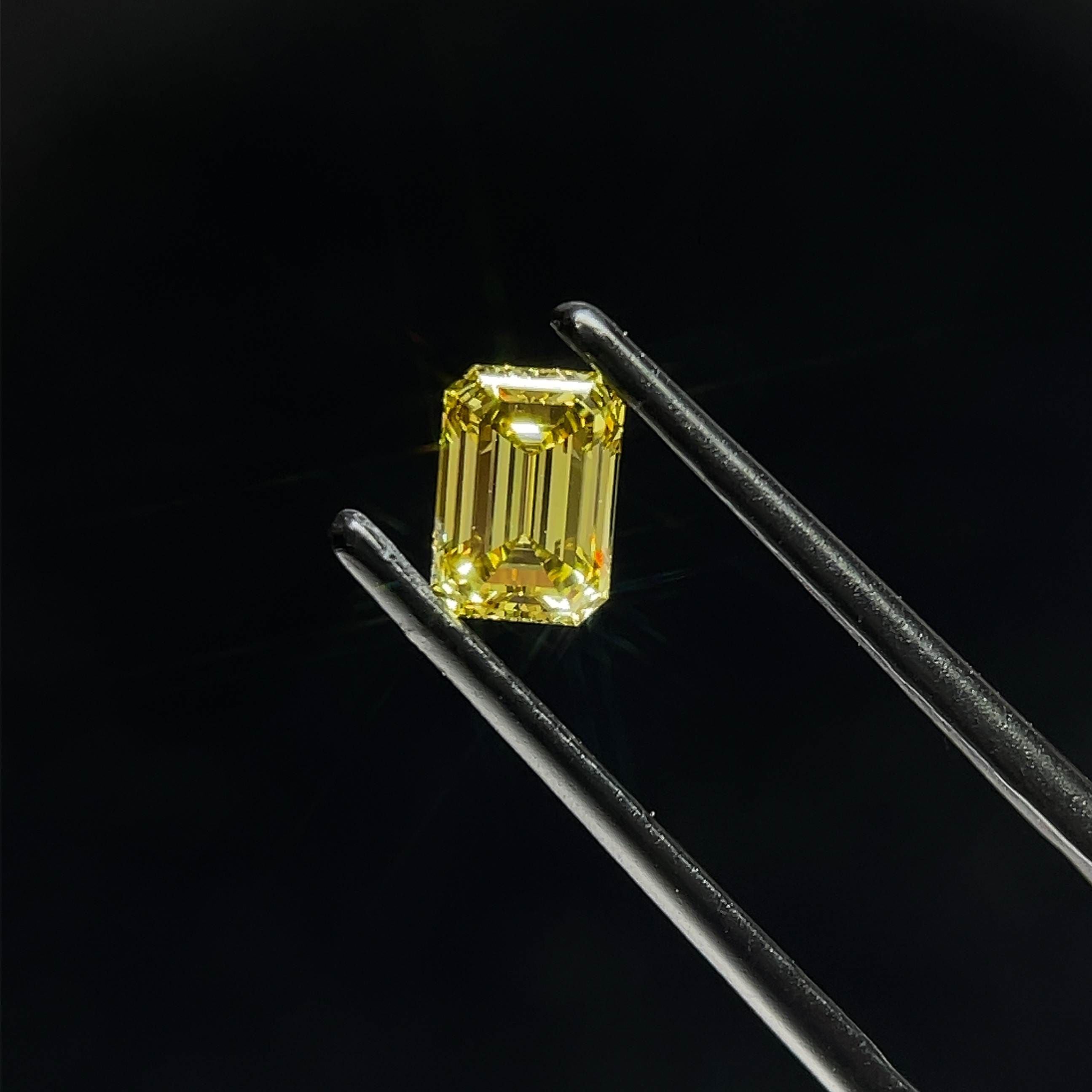0.75 Carat Emerald Cut Fancy Yellow