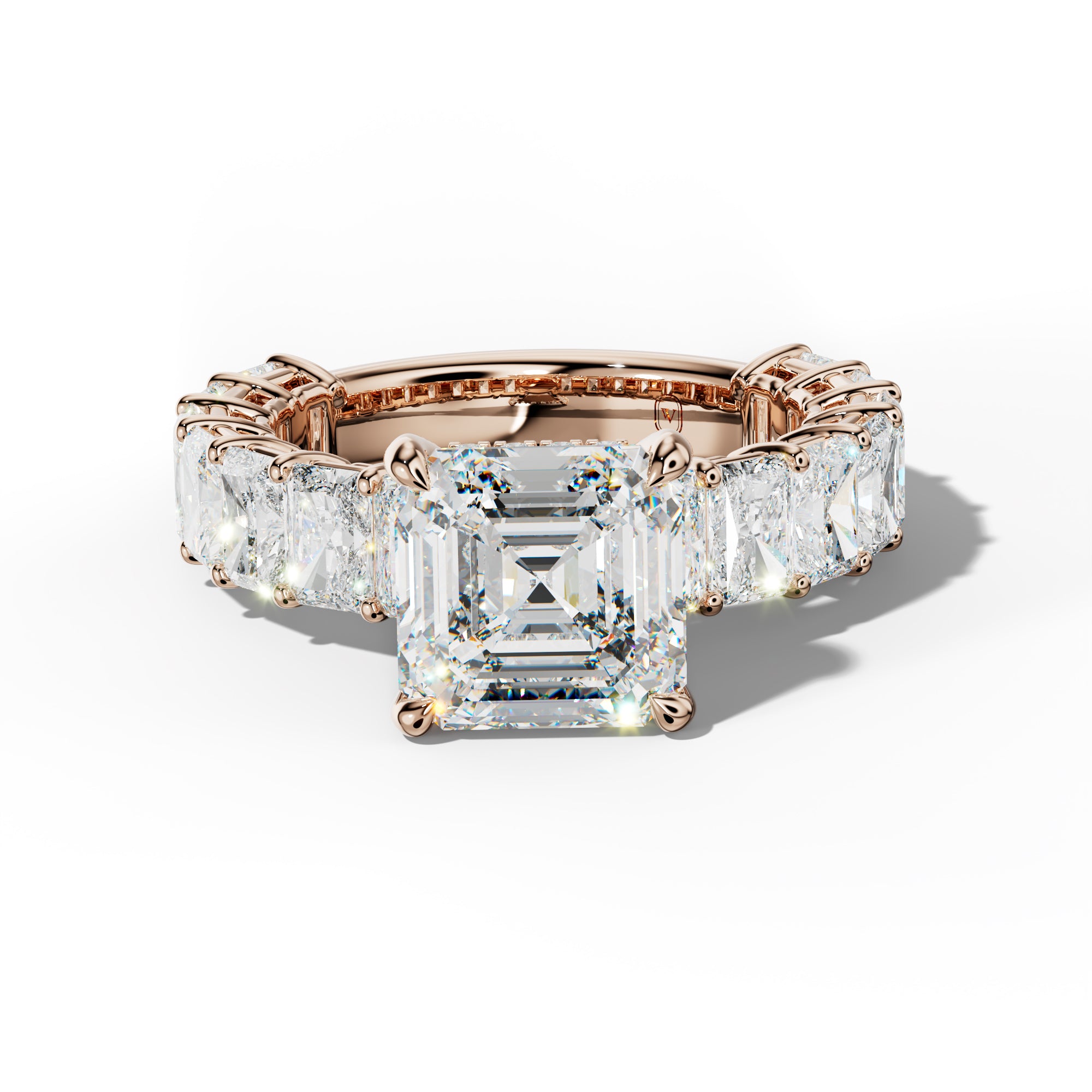 Naomi Asscher Diamond Engagement Ring With Radiant Side Stones