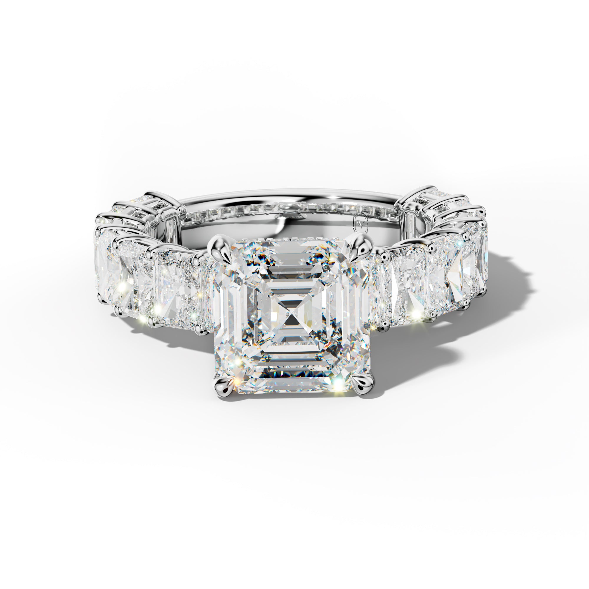 Naomi Asscher Diamond Engagement Ring With Radiant Side Stones