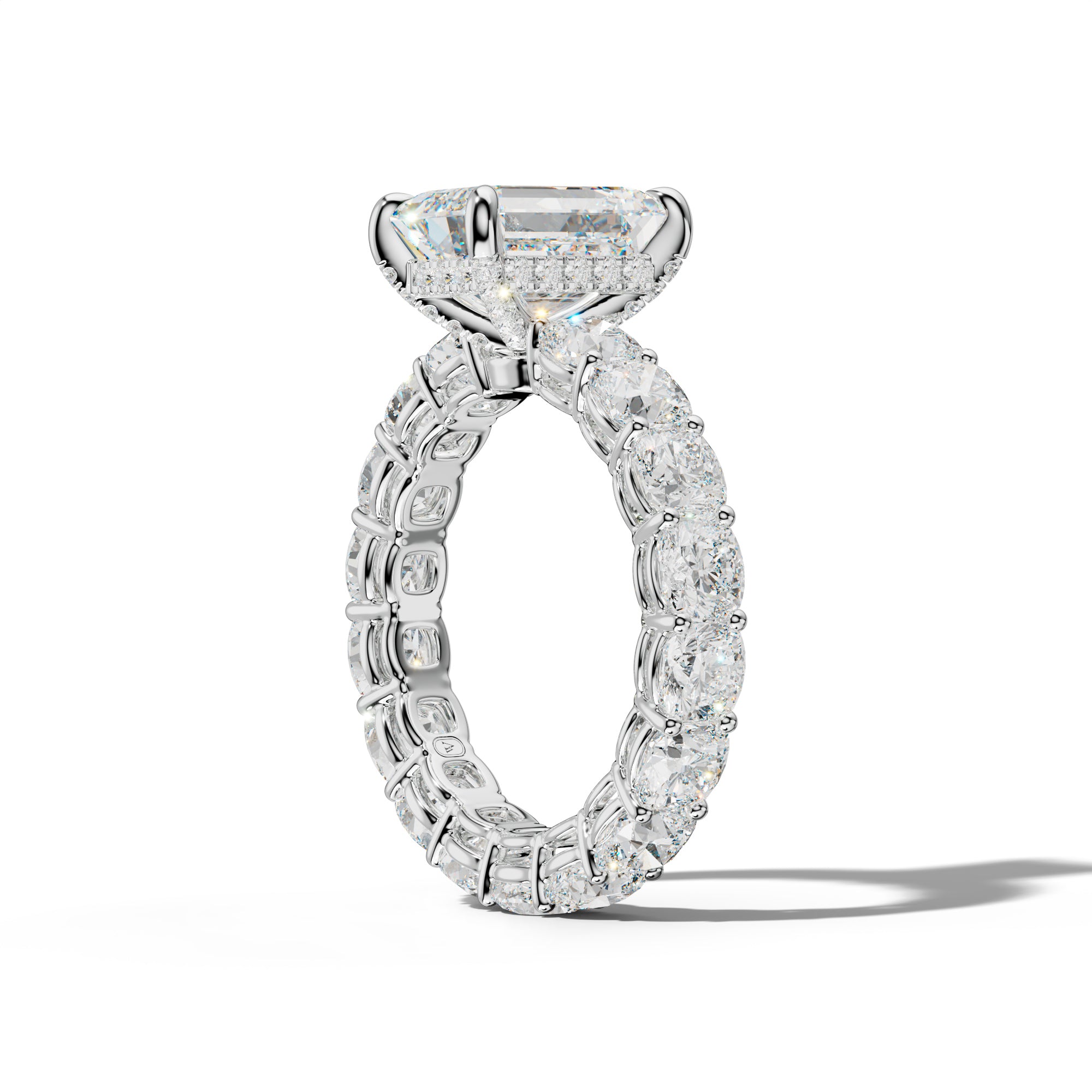 Celine Emerald Cut Engagement Ring With Cushion Side Stones