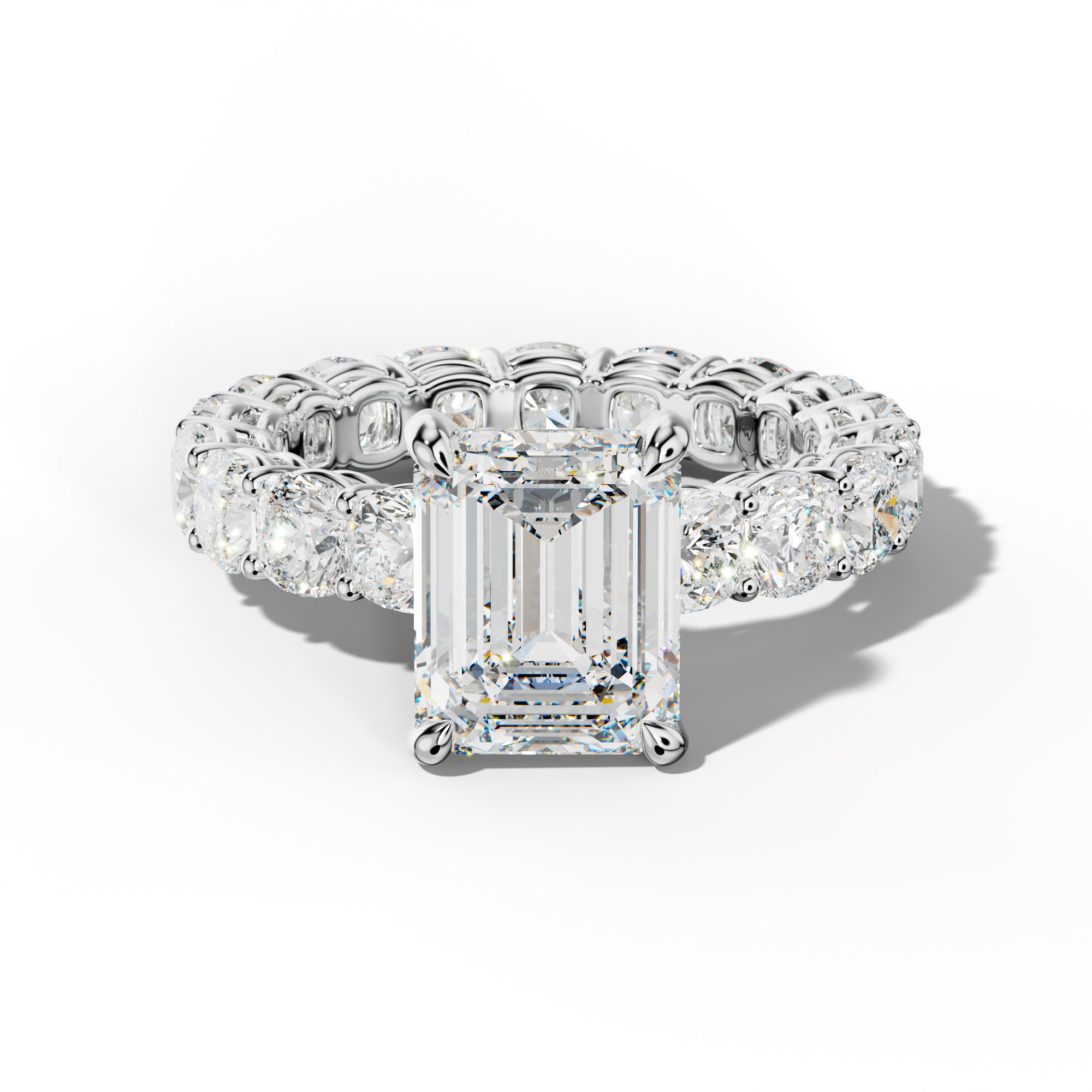Celine Emerald Cut Engagement Ring With Cushion Side Stones