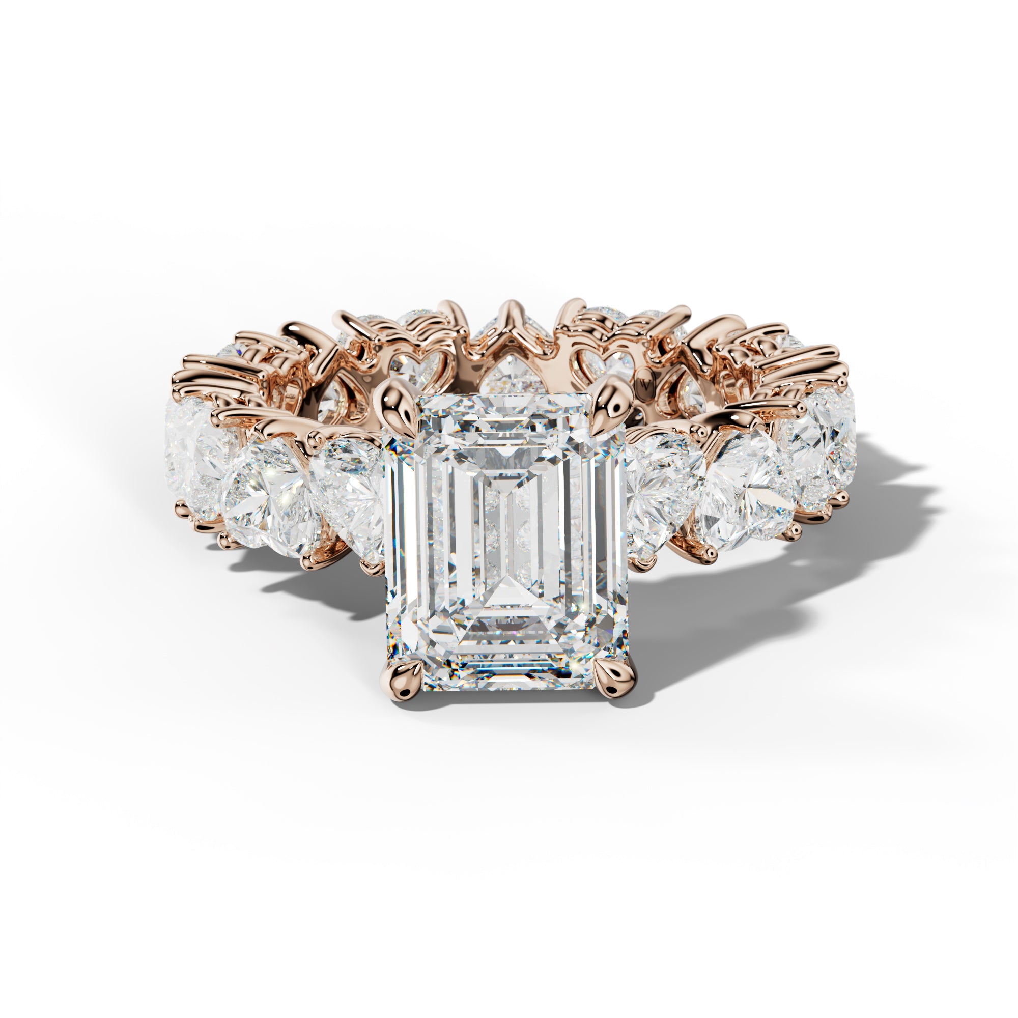 Melany Emerald Cut Engagement Ring With Heart Side Stones