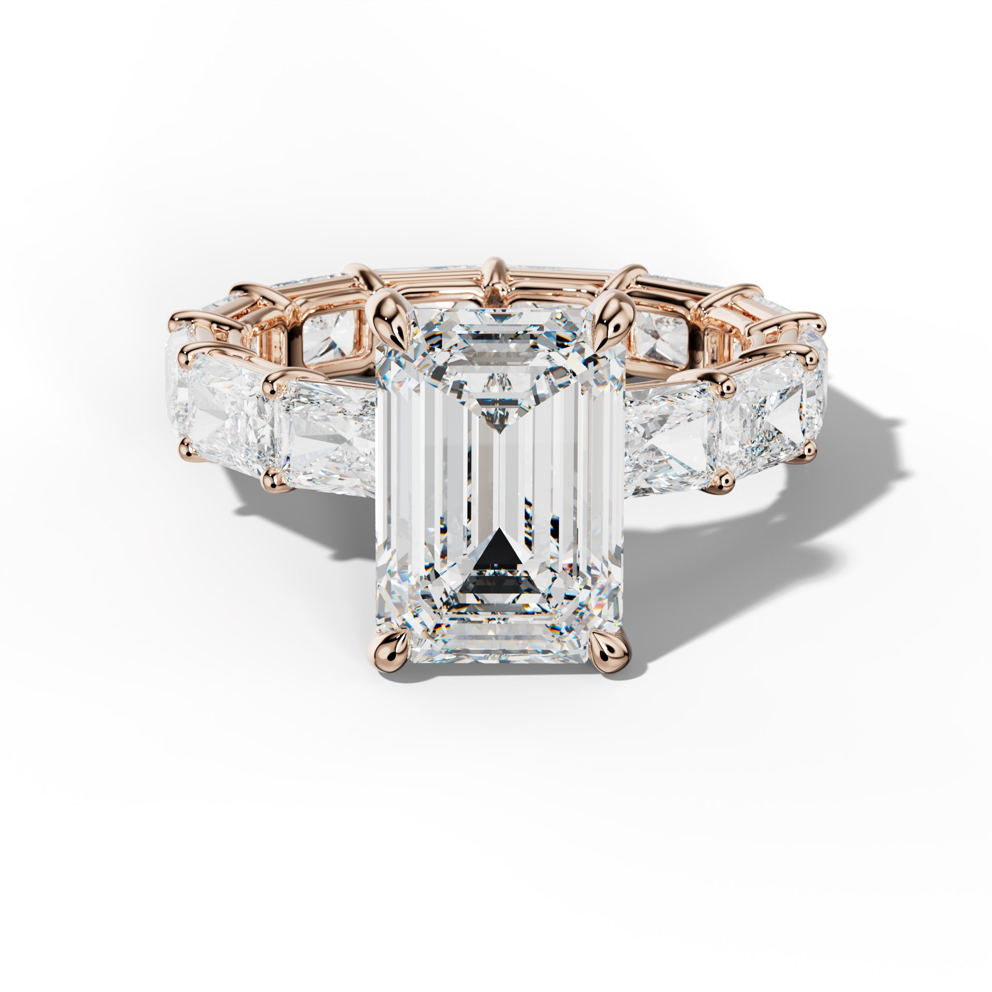 Mavis Emerald Cut Engagement Ring With East West Radiant Side Stones