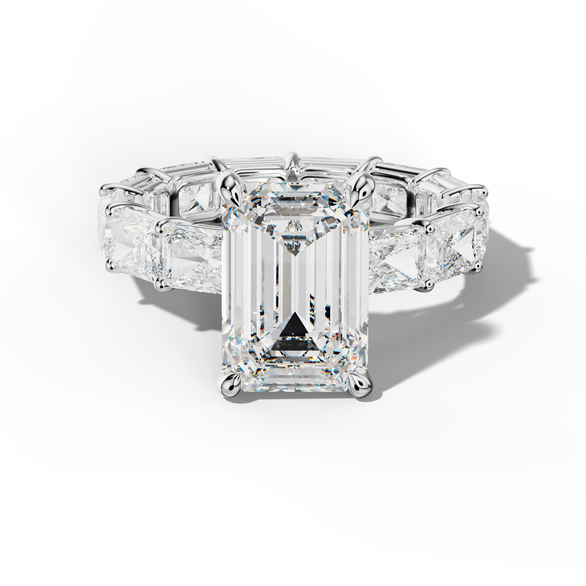 Mavis Emerald Cut Engagement Ring With East West Radiant Side Stones