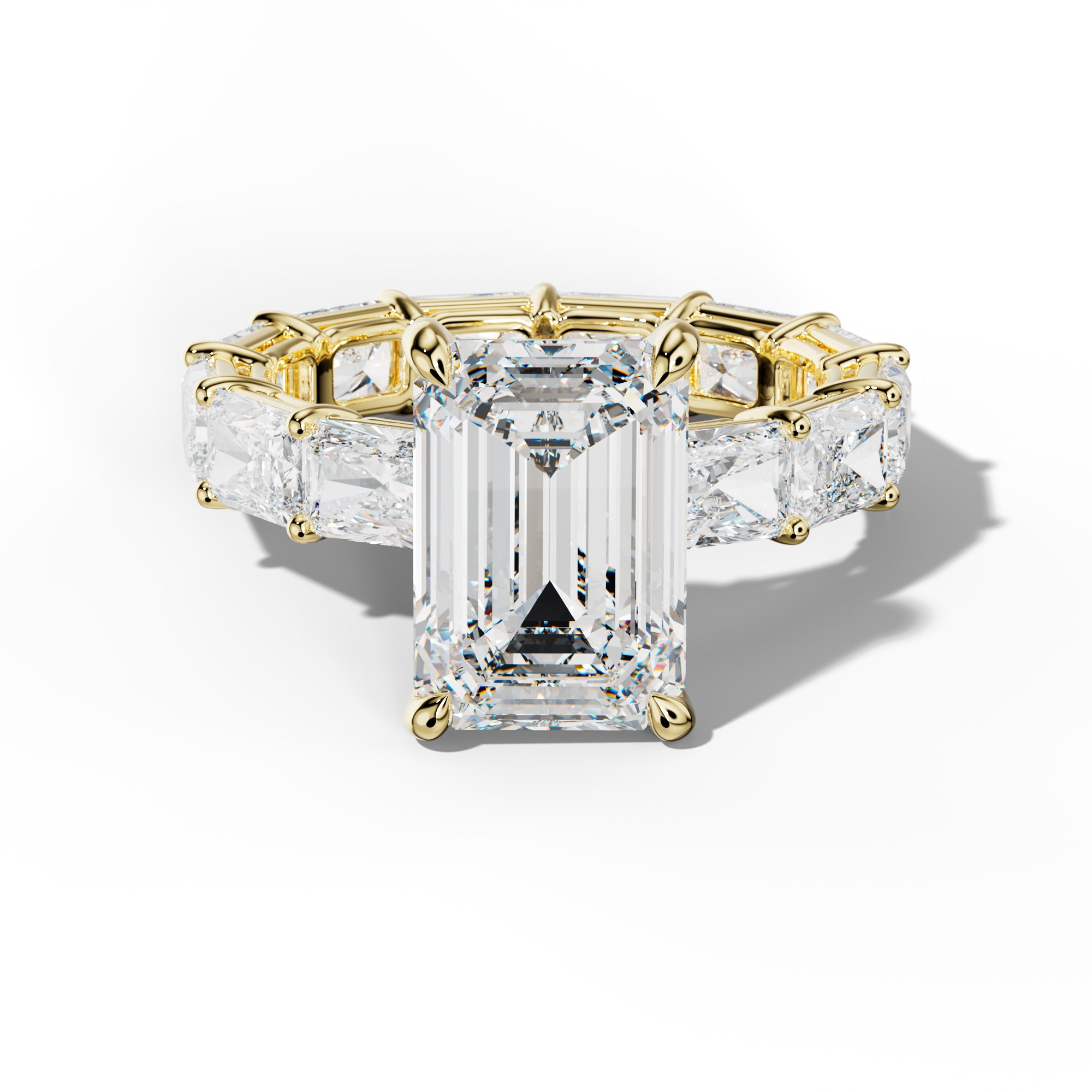 Mavis Emerald Cut Engagement Ring With East West Radiant Side Stones