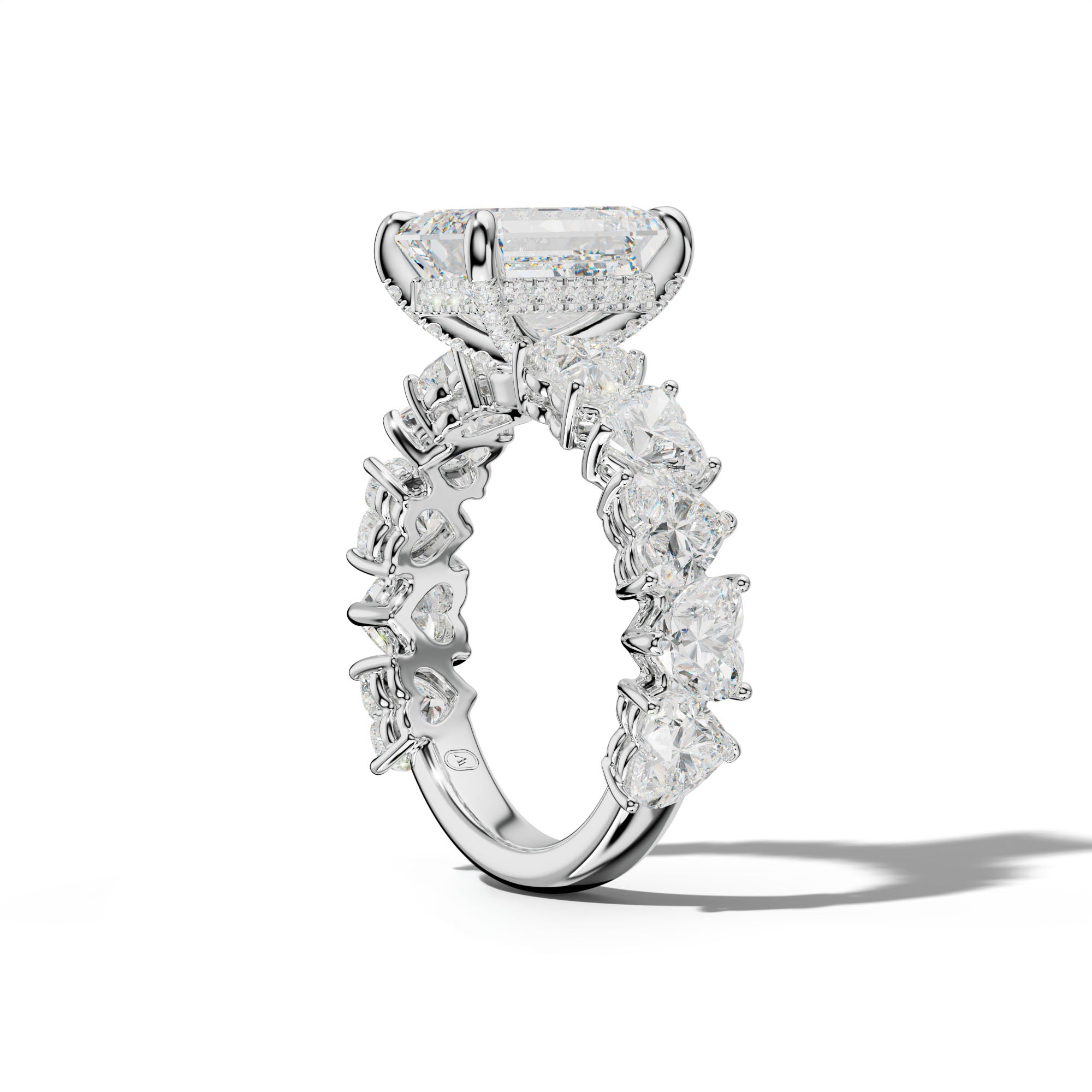 Logan Emerald Cut Engagement Ring With Heart Side Stones