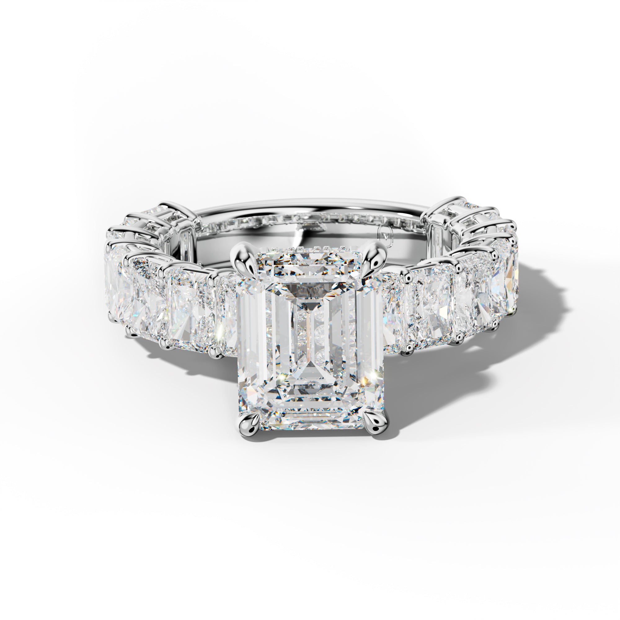 Naomi Emerald Cut Engagement Ring With Radiant Side Stones