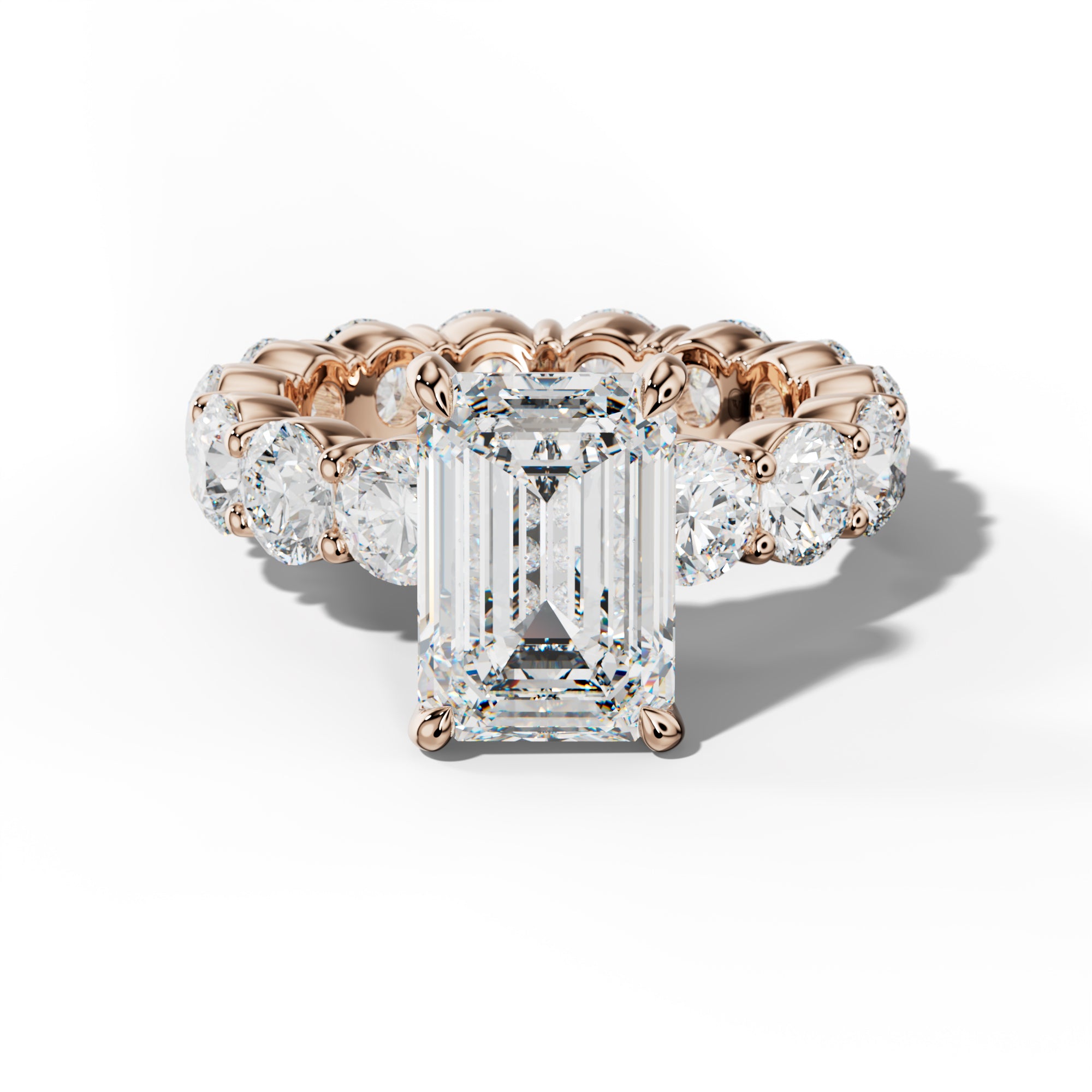 Fernanda Emerald Cut Engagement Ring With Round Side Stones