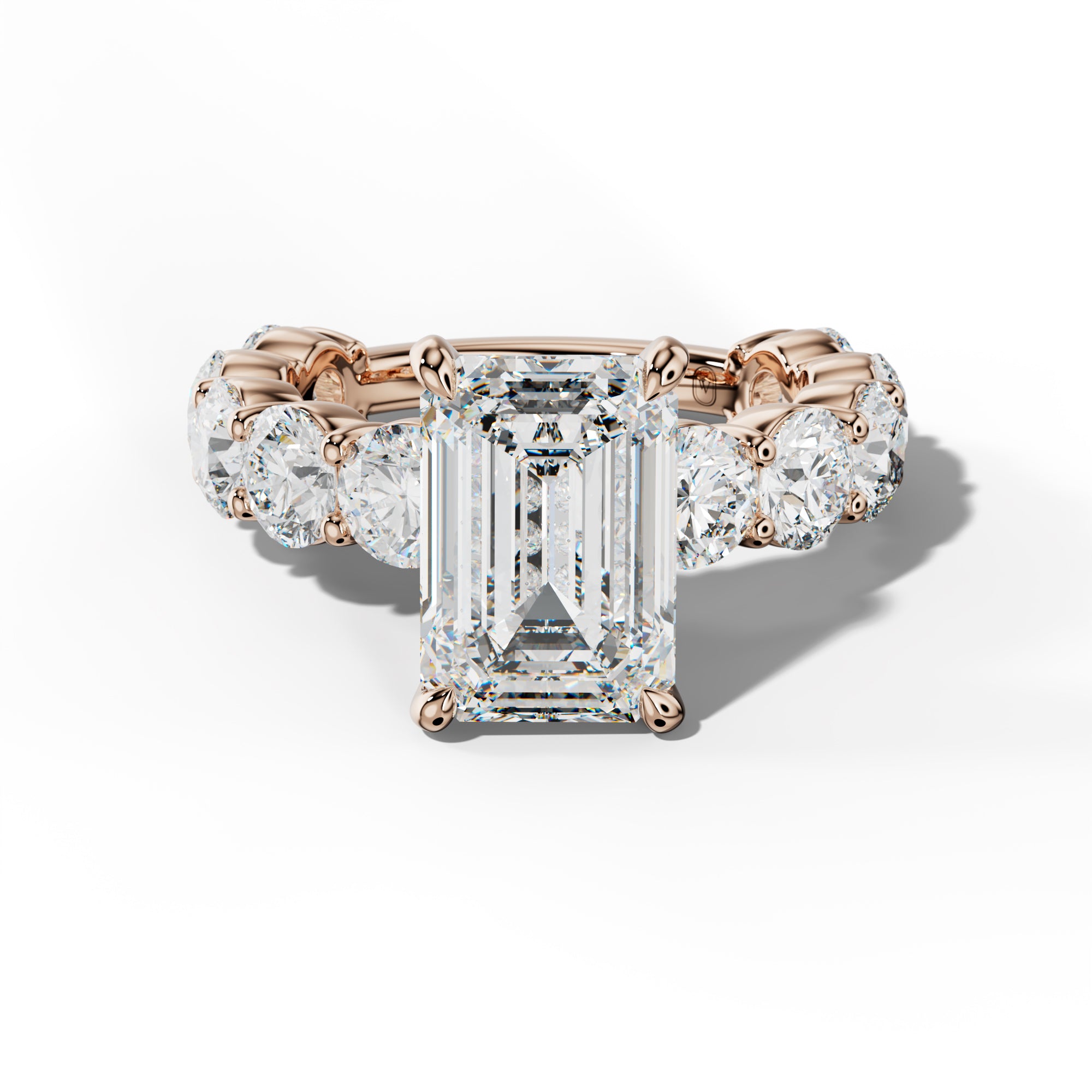 Marley Emerald Cut Engagement Ring With Round Side Stones