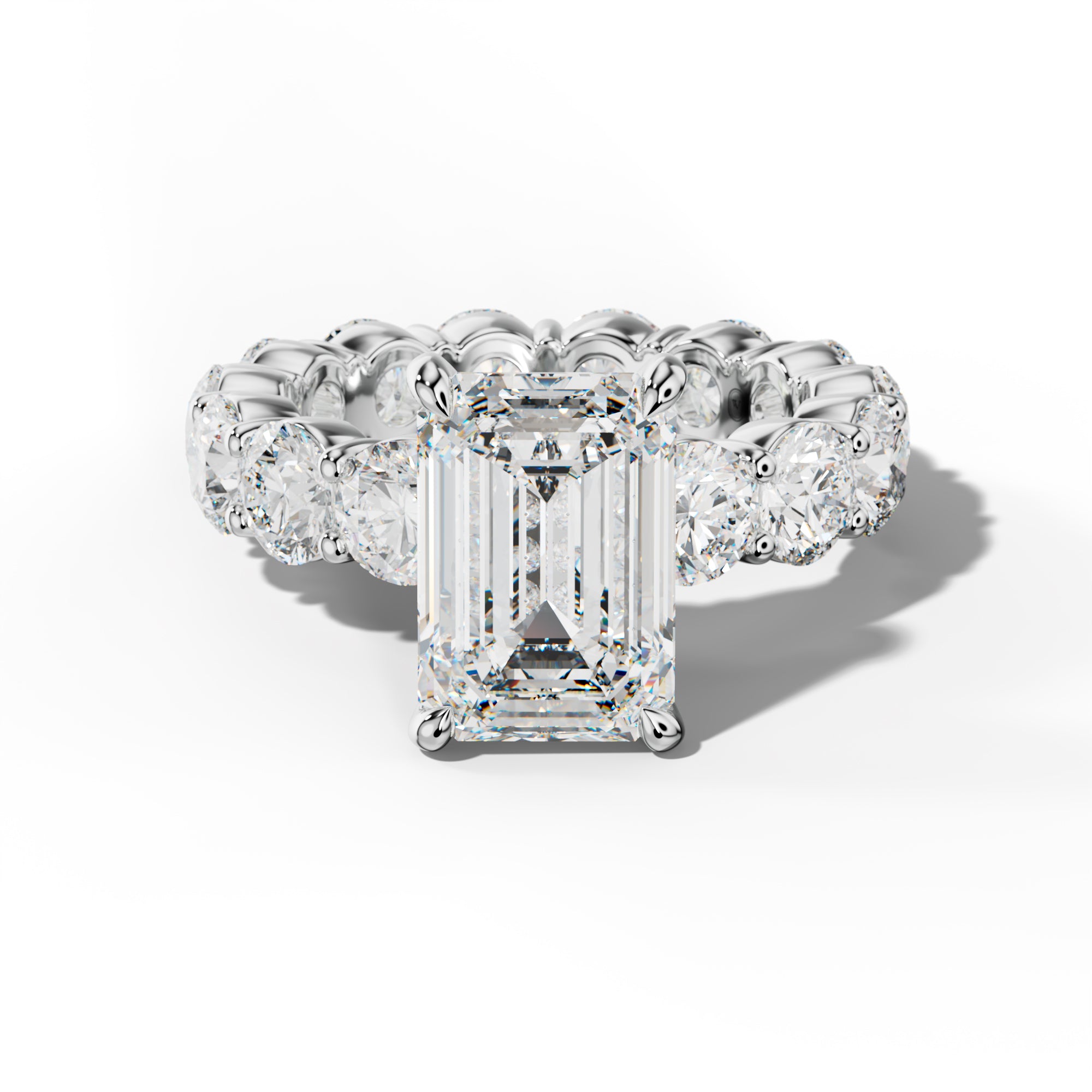 Fernanda Emerald Cut Engagement Ring With Round Side Stones