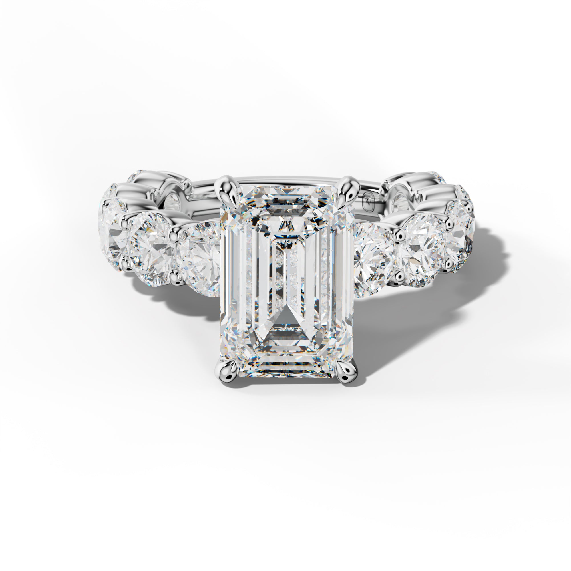 Marley Emerald Cut Engagement Ring With Round Side Stones