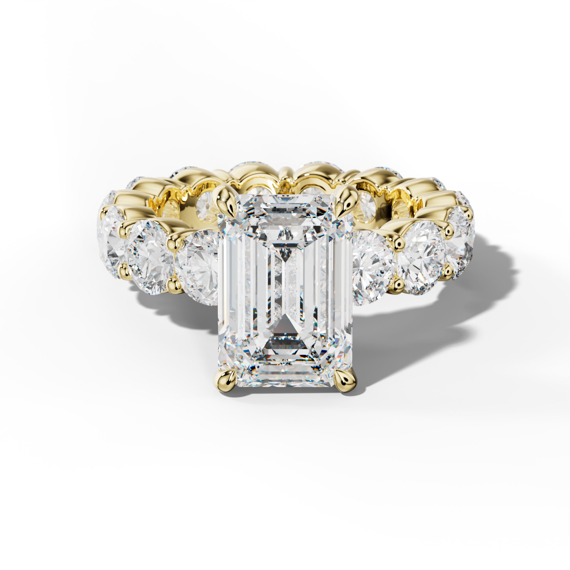 Fernanda Emerald Cut Engagement Ring With Round Side Stones