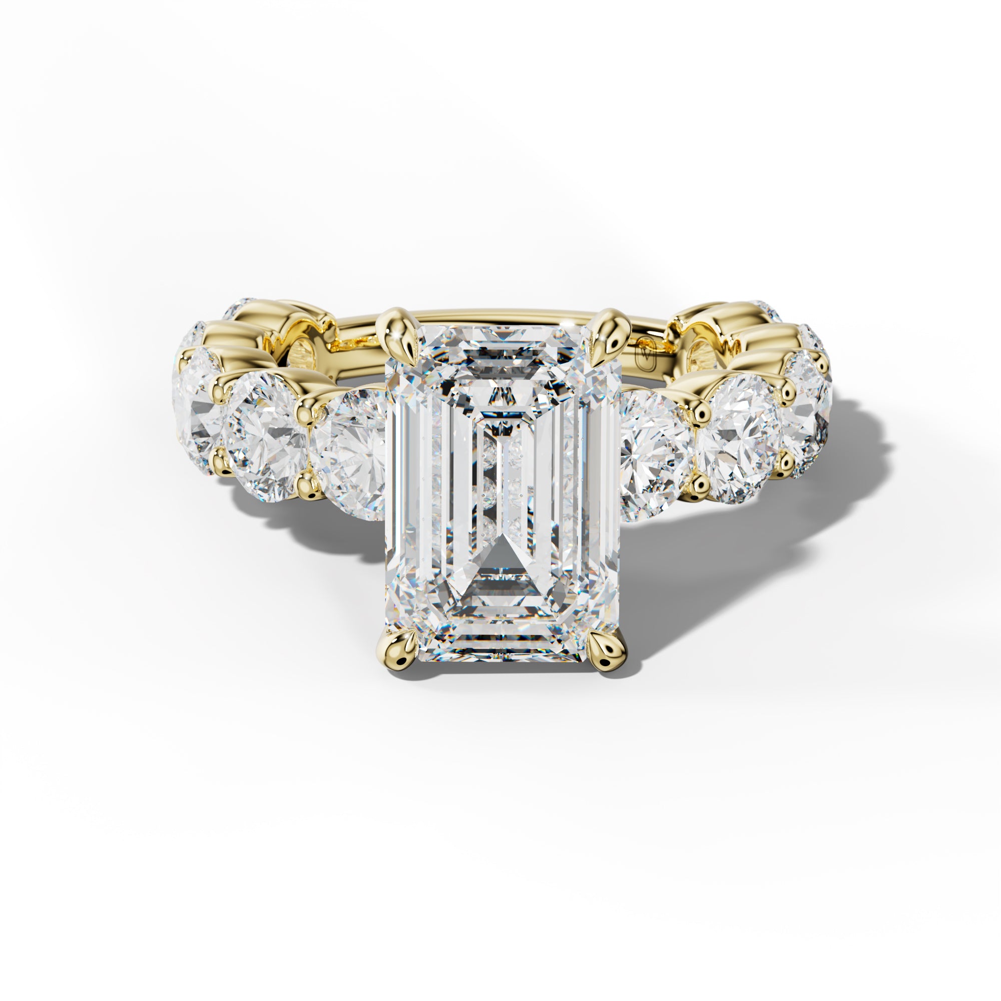 Marley Emerald Cut Engagement Ring With Round Side Stones