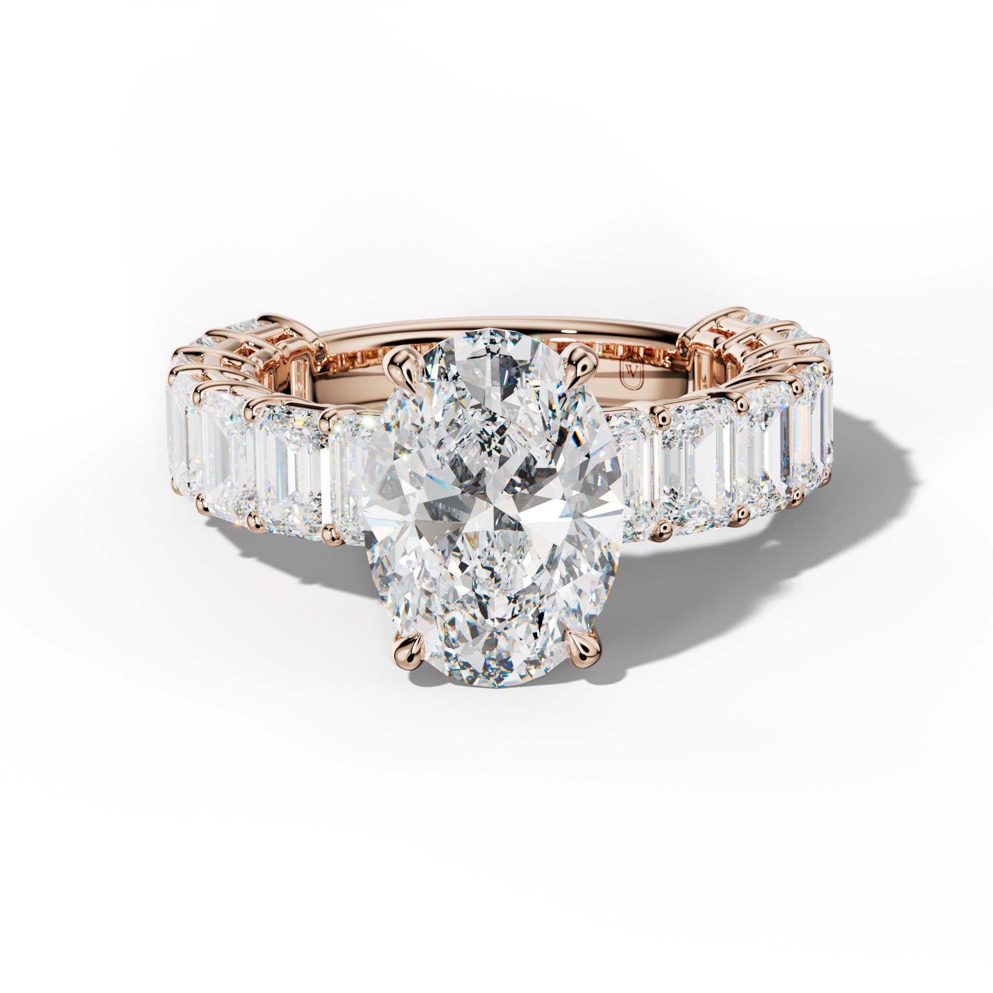 Mina Oval Diamond Engagement Ring With Emerald Cut Side Stones