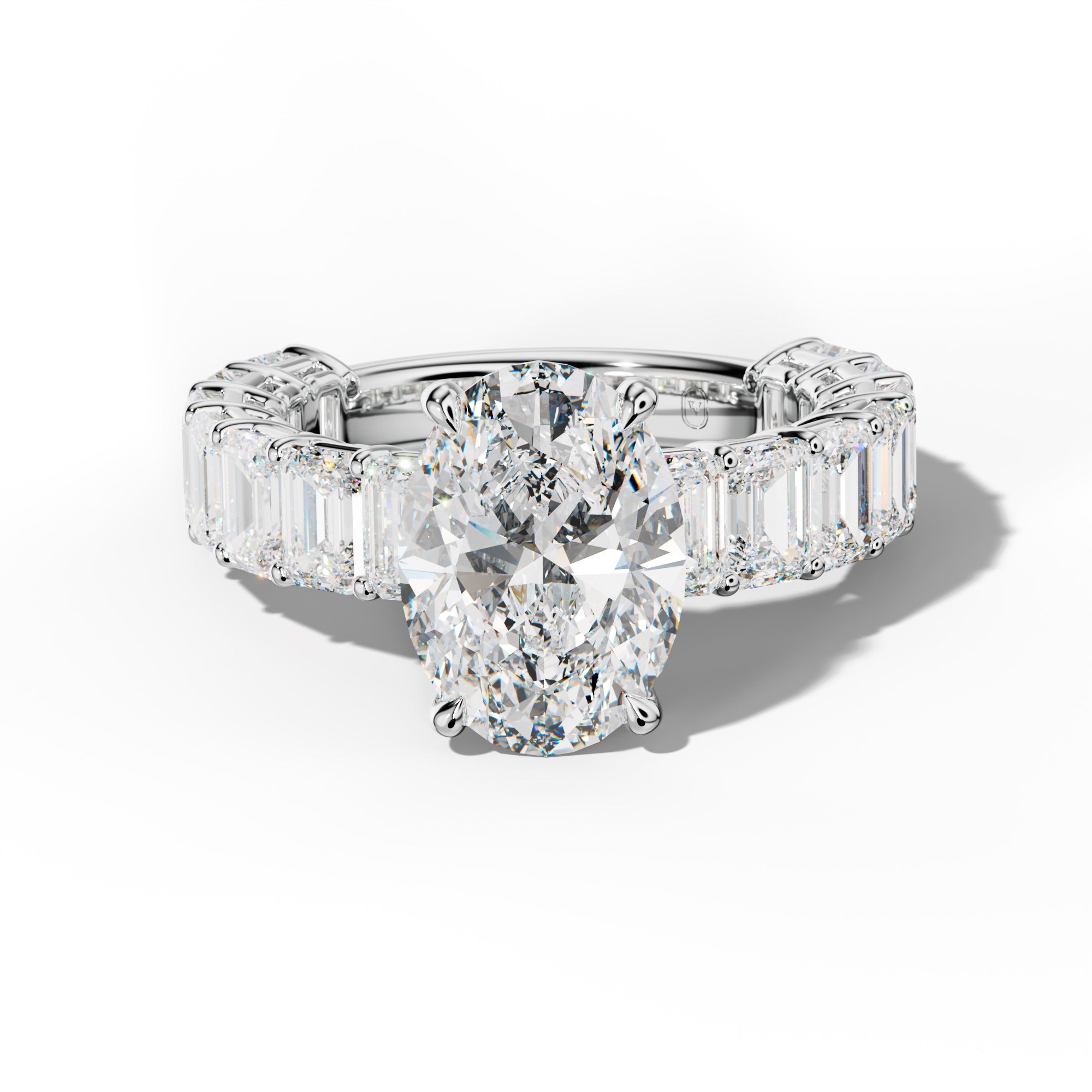 Mina Oval Diamond Engagement Ring With Emerald Cut Side Stones