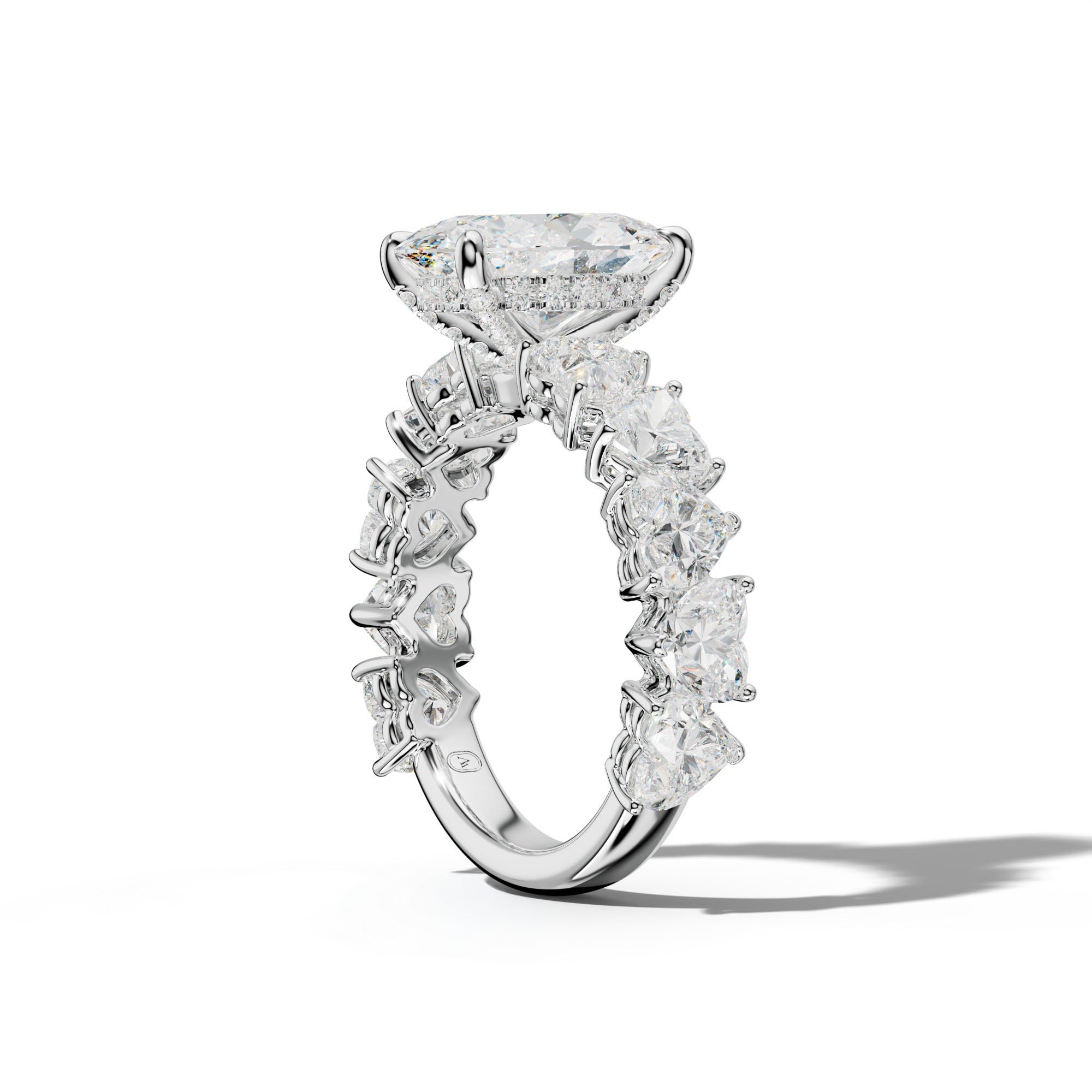 Logan Oval Diamond Engagement Ring With Heart Side Stones