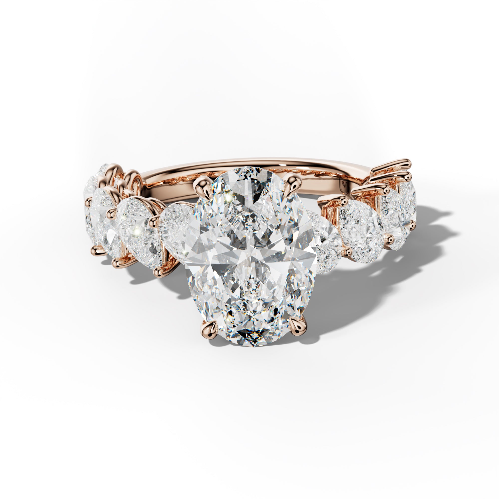 Elisabeth Oval Diamond Engagement Ring With Slanted Pear Side Stones