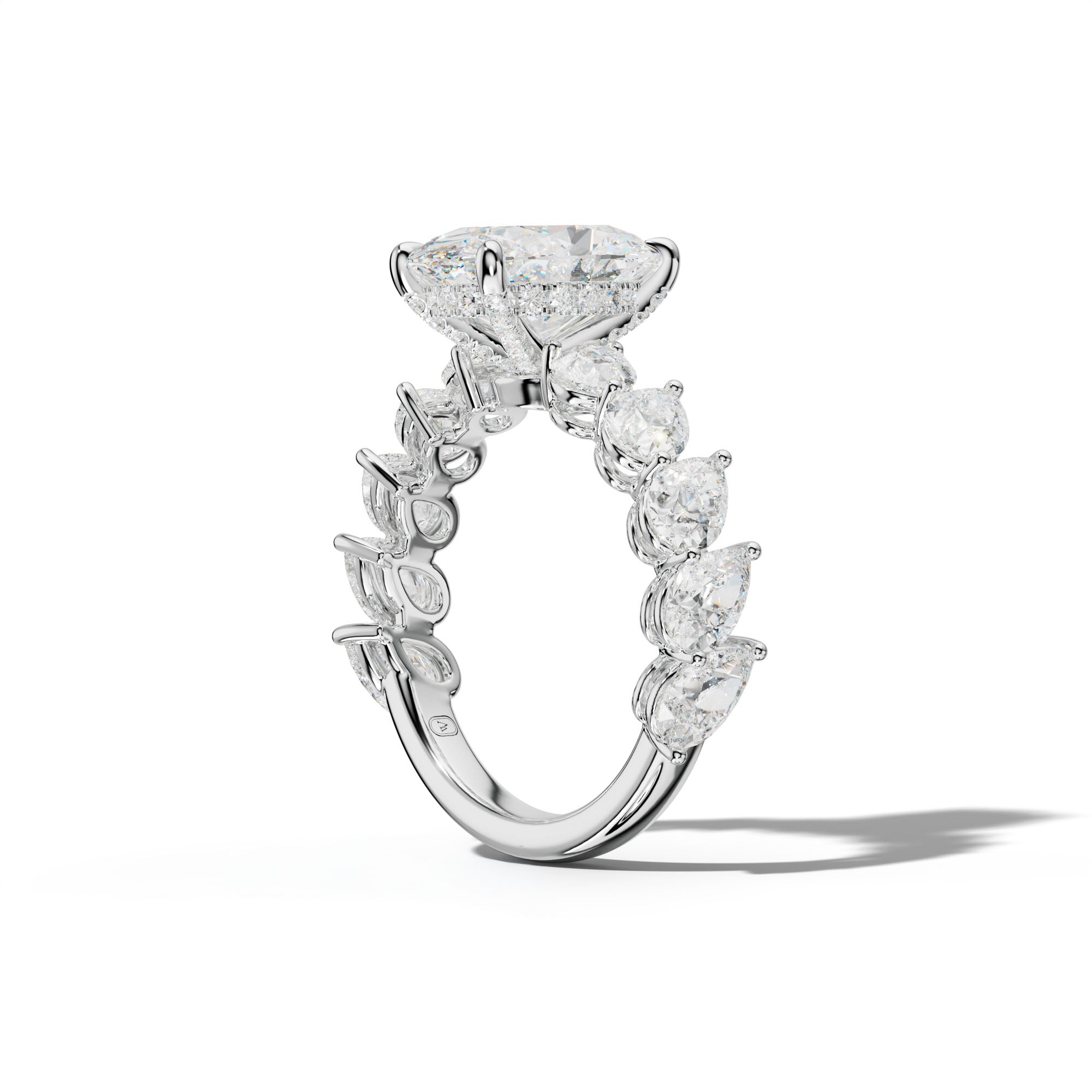 Elisabeth Oval Diamond Engagement Ring With Slanted Pear Side Stones