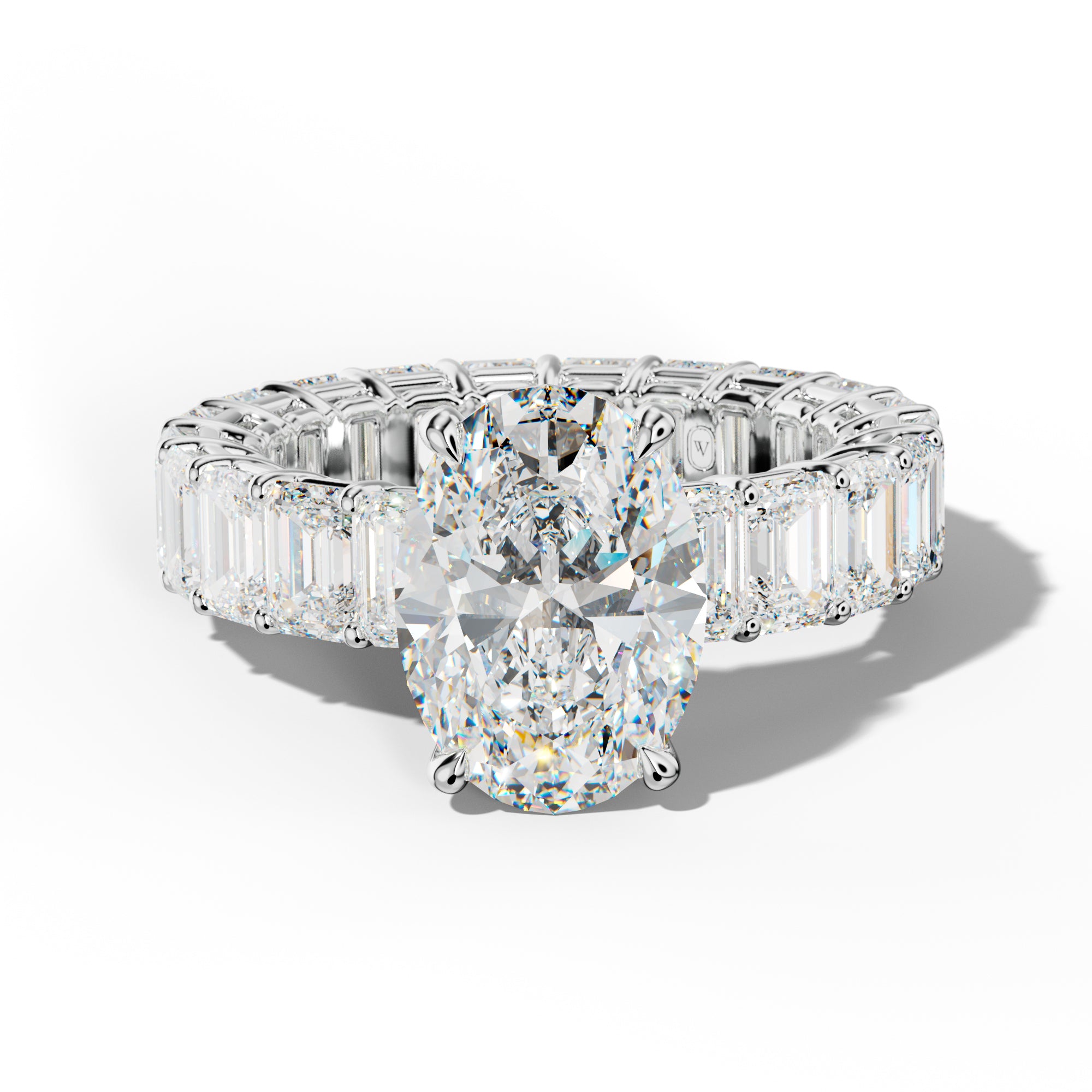 Jazmine Oval Diamond Engagement Ring With Emerald Cut Side Stones
