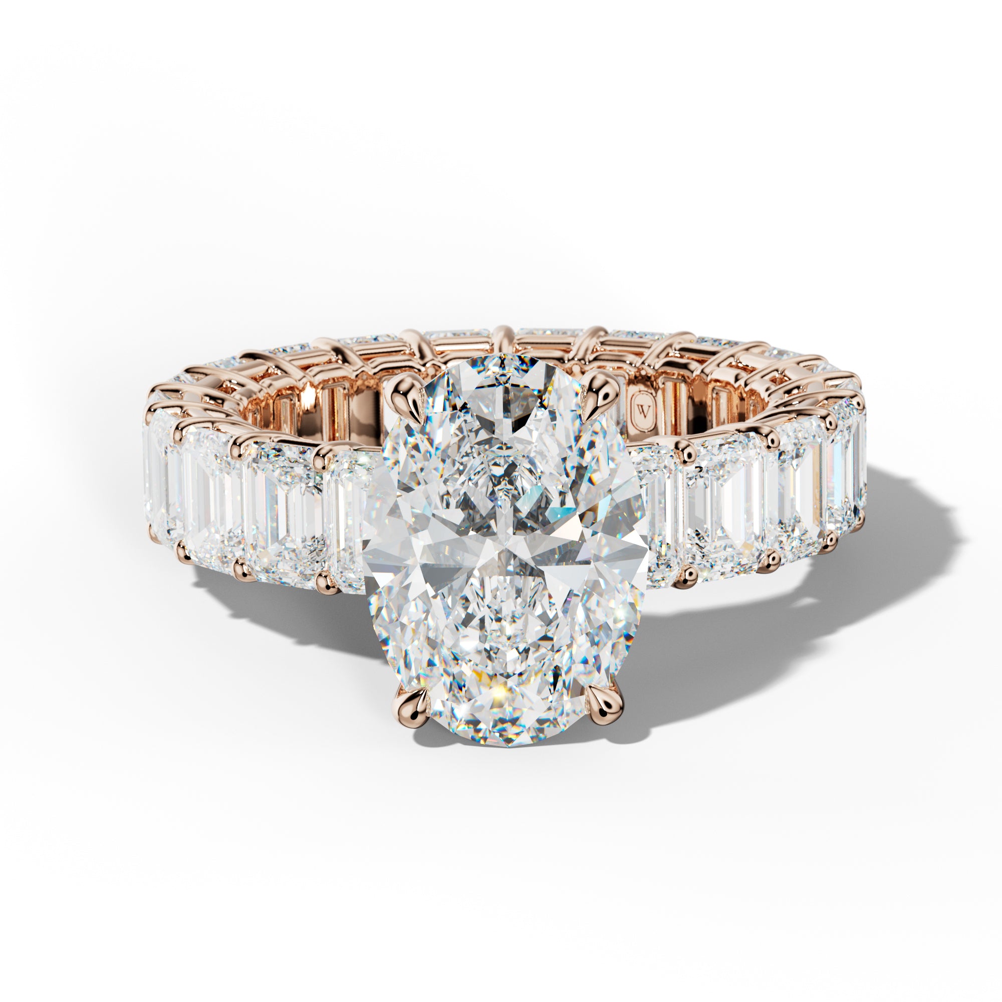 Jazmine Oval Diamond Engagement Ring With Emerald Cut Side Stones