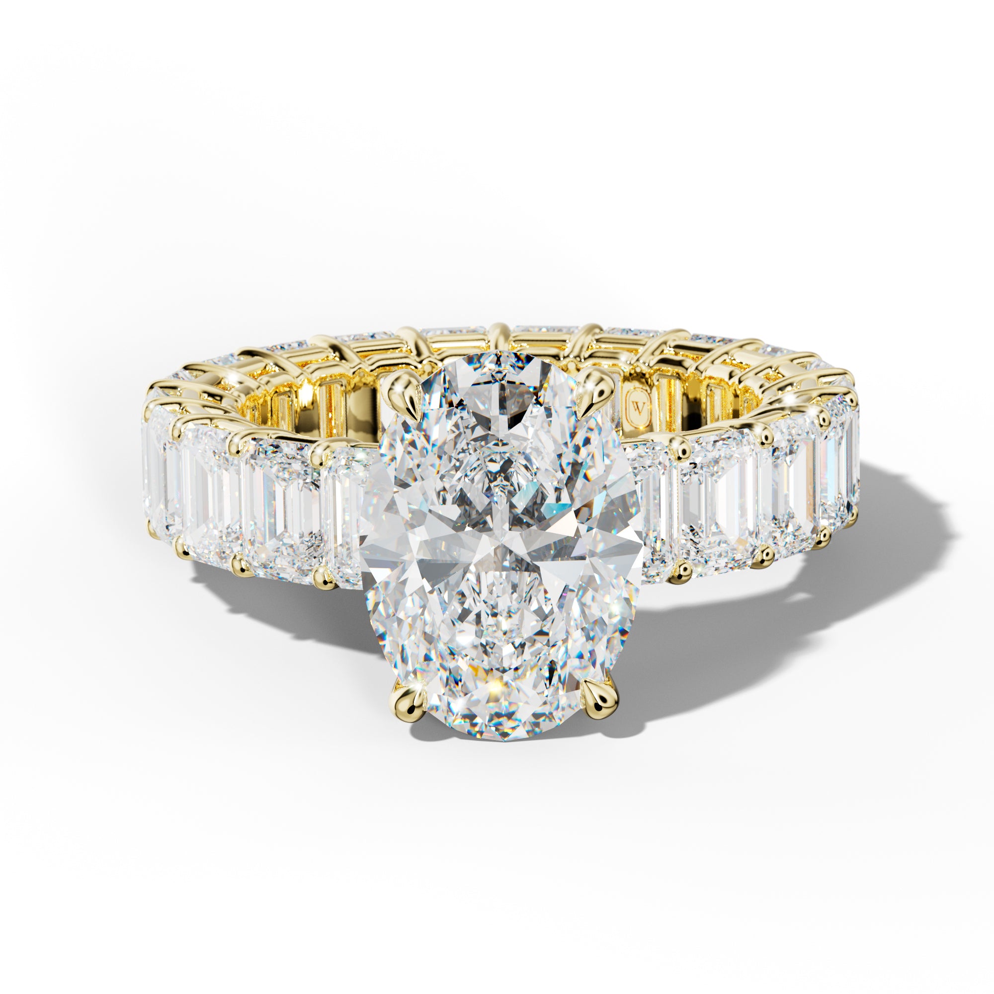 Jazmine Oval Diamond Engagement Ring With Emerald Cut Side Stones