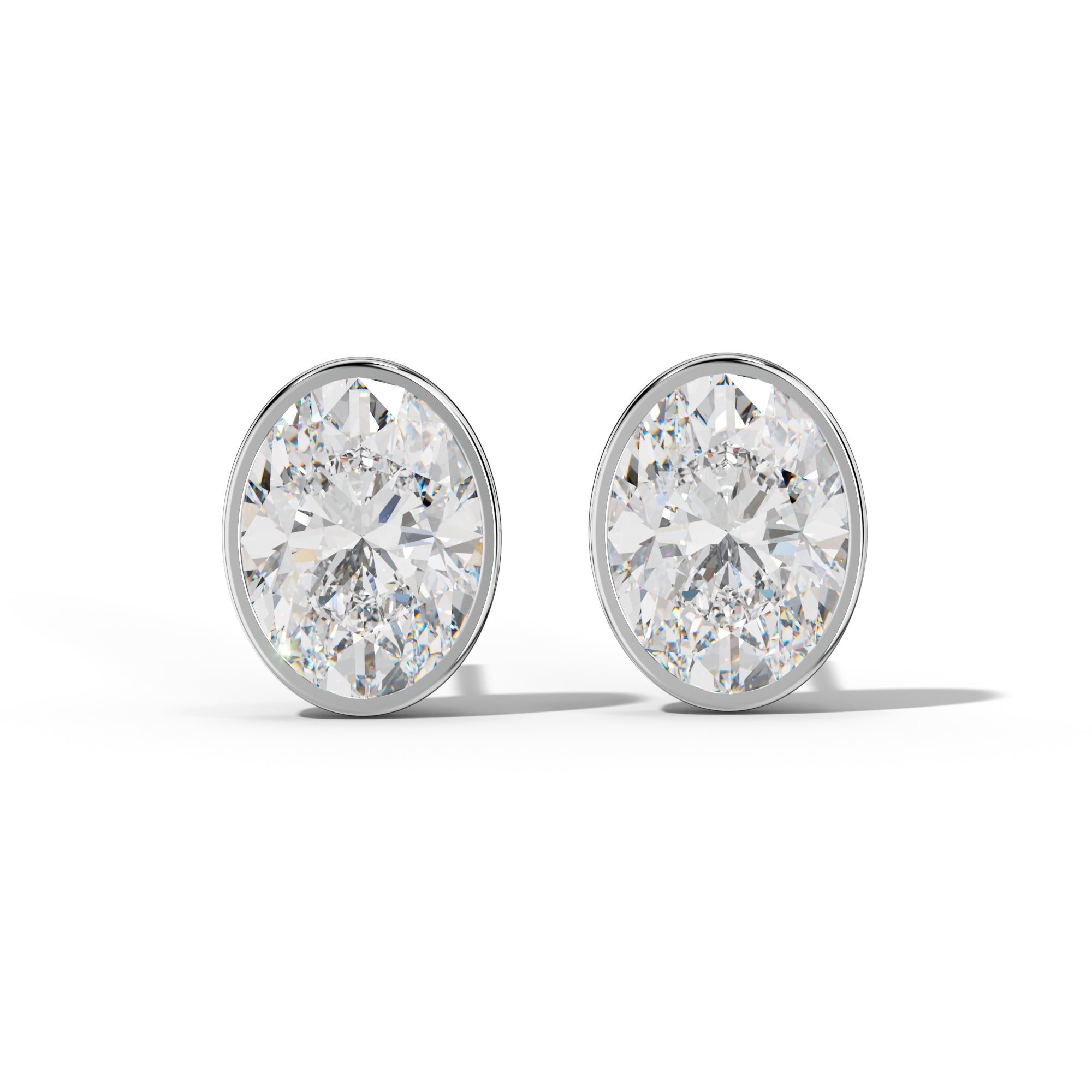 Oval Diamond Stud Earrings With Martini Bezel set