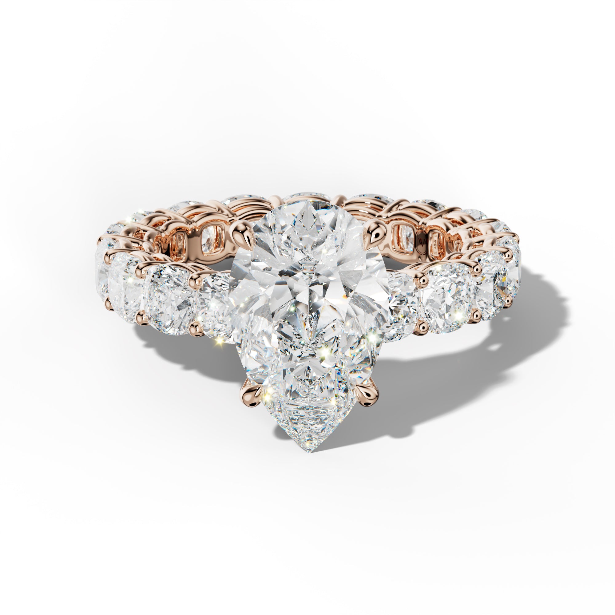 Celine Pear Shape Engagement Ring With Cushion Side Stones